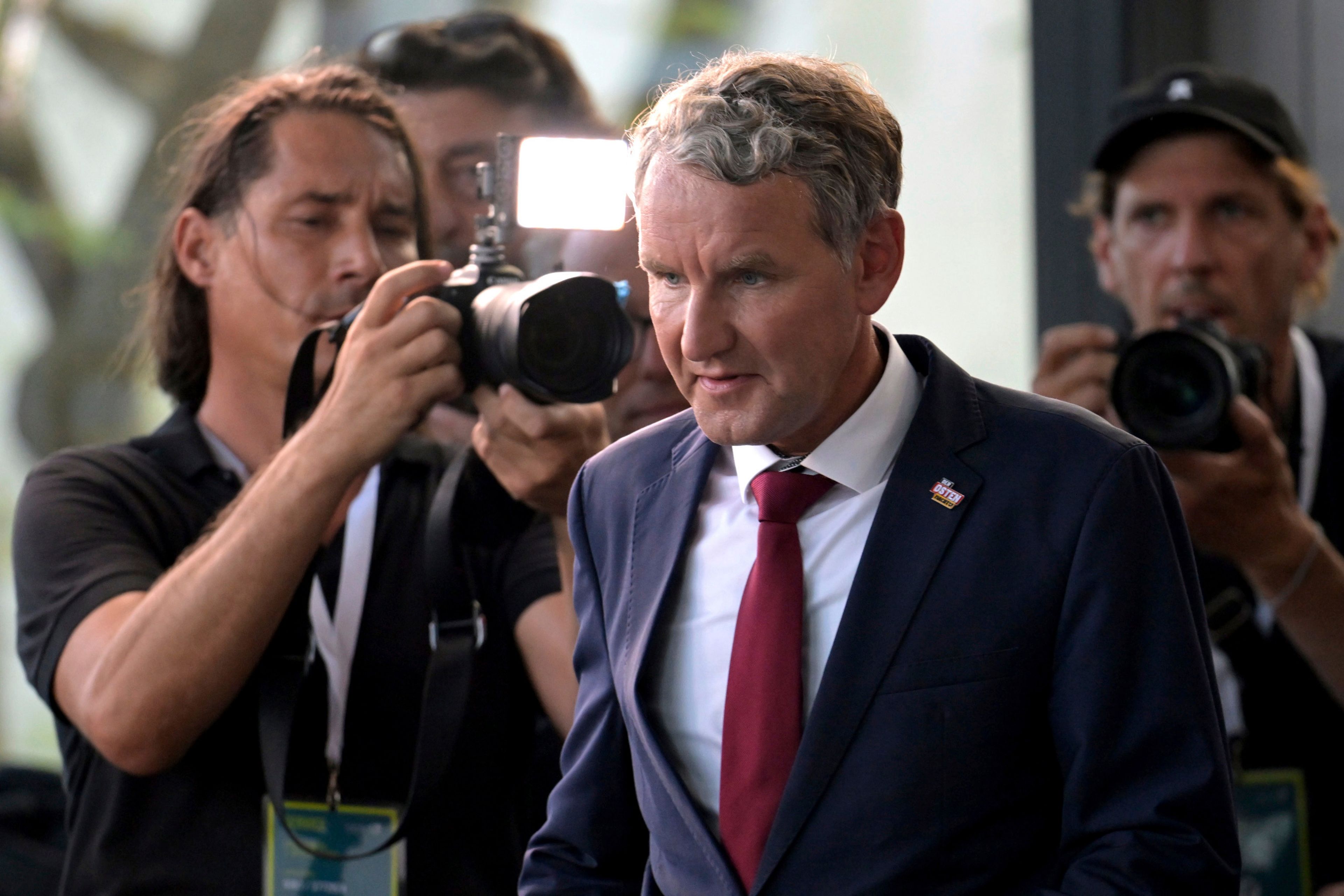 Bjoern Hoecke, top candidate in Thuringia of the far-right Alternative for Germany, walks through the state parliament in Erfurt, Sunday, Sept, 1, 2024. (Jacob Schr'ter/dpa via AP)