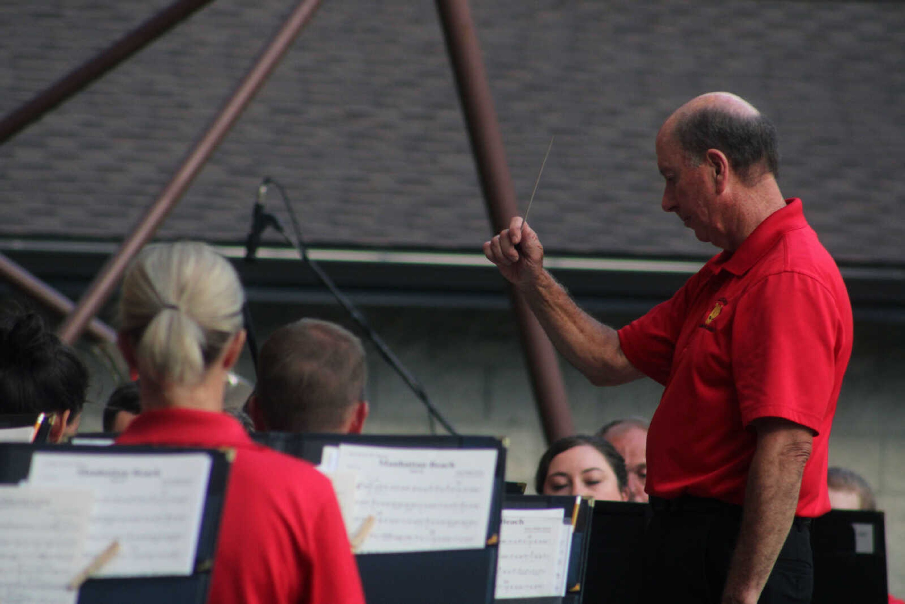 Jackson Municipal Band conductor Scott Vangilder leads the band in the performance on Thursday, July 15, 2021, at the Nick Leist Memorial Bandshell at Jackson City Park in Jackson.