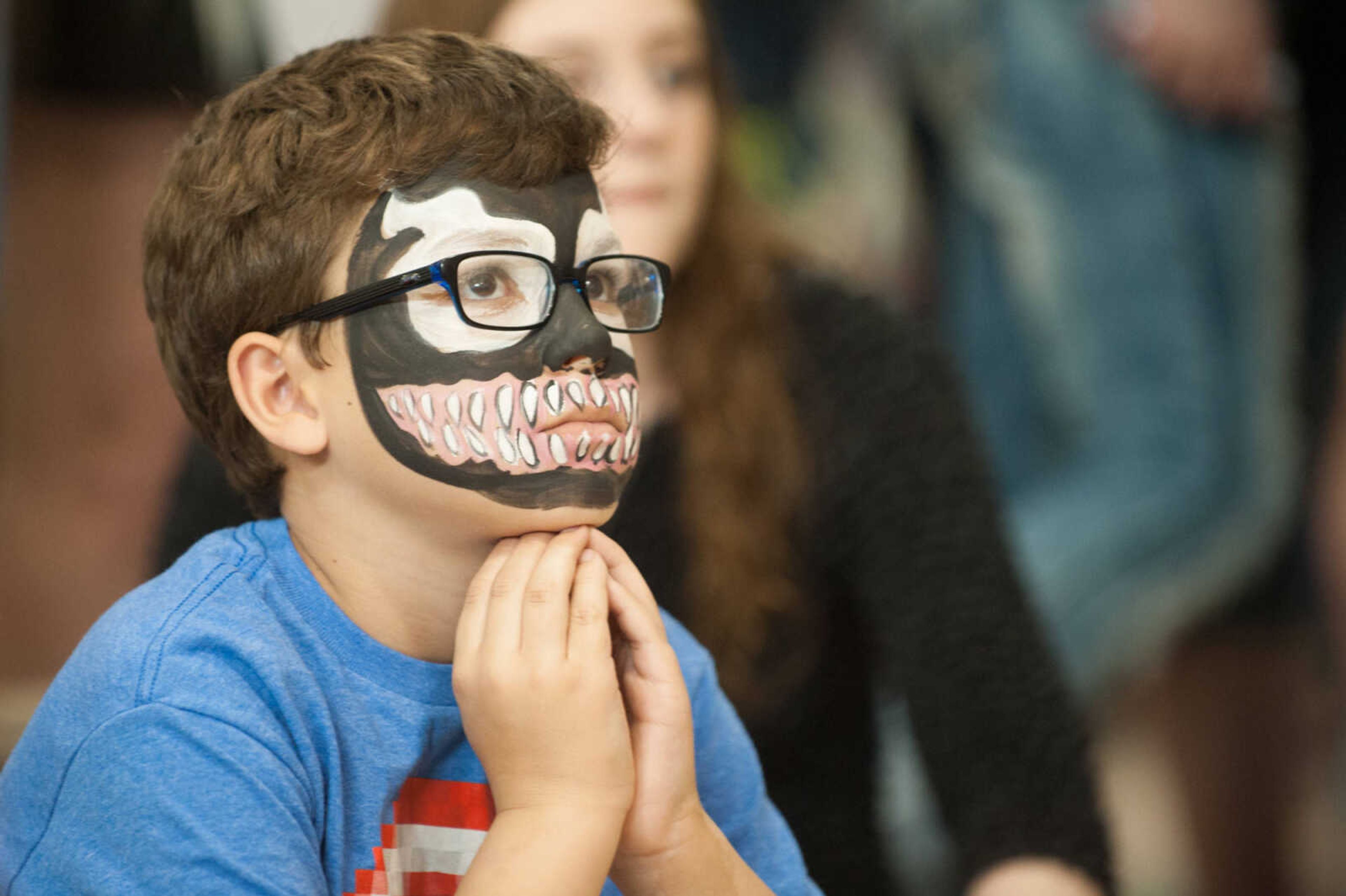 GLENN LANDBERG ~ glandberg@semissourian.com

Zack Hodges, painted as Venom watches the children's division of the costume contest during the Cape Comic Con Saturday, April 18, 2015 at the Osage Centre.