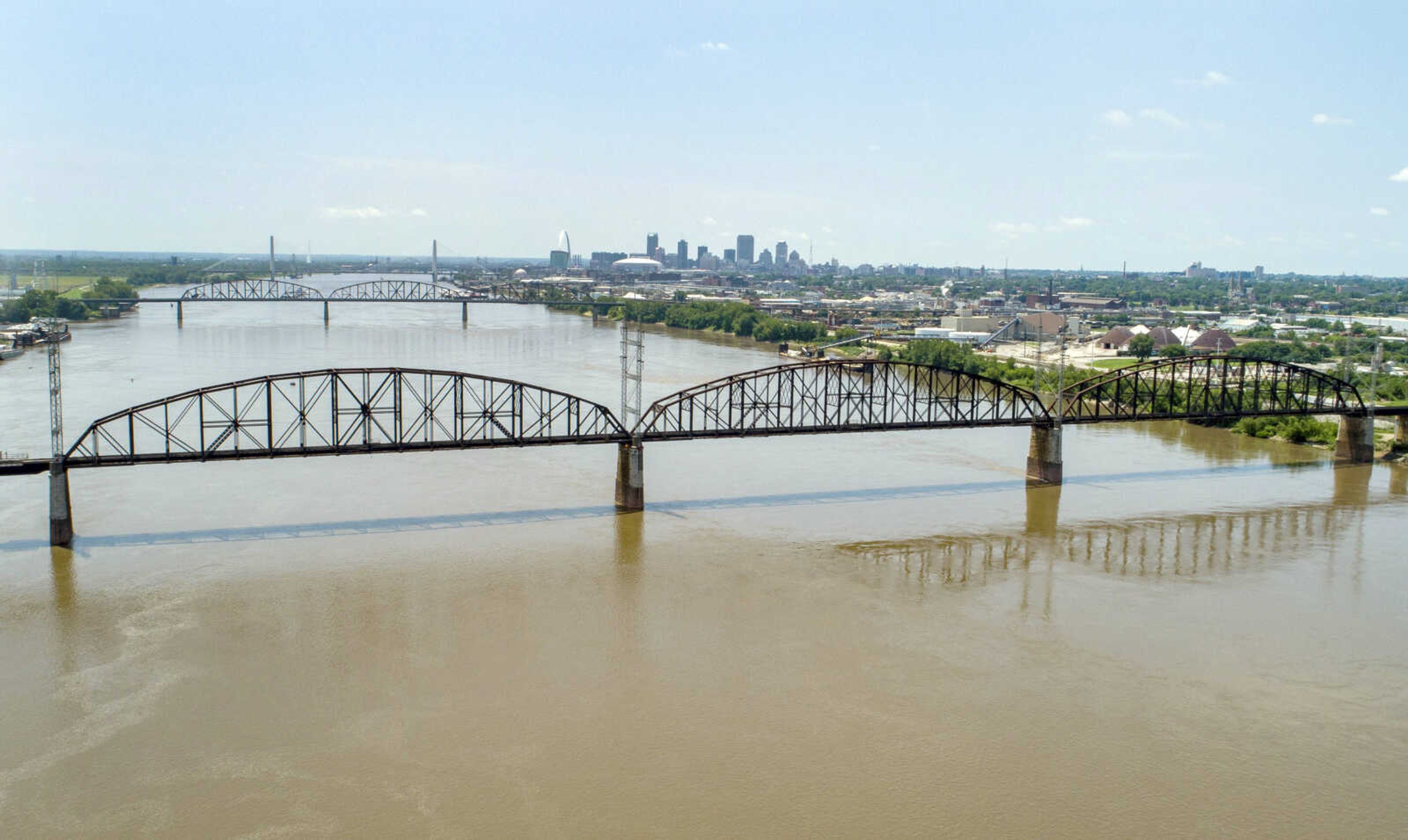 The Merchants Bridge is seen in the foreground Wednesday as it crosses the Mississippi River as the St. Louis skyline is seen in the distance.