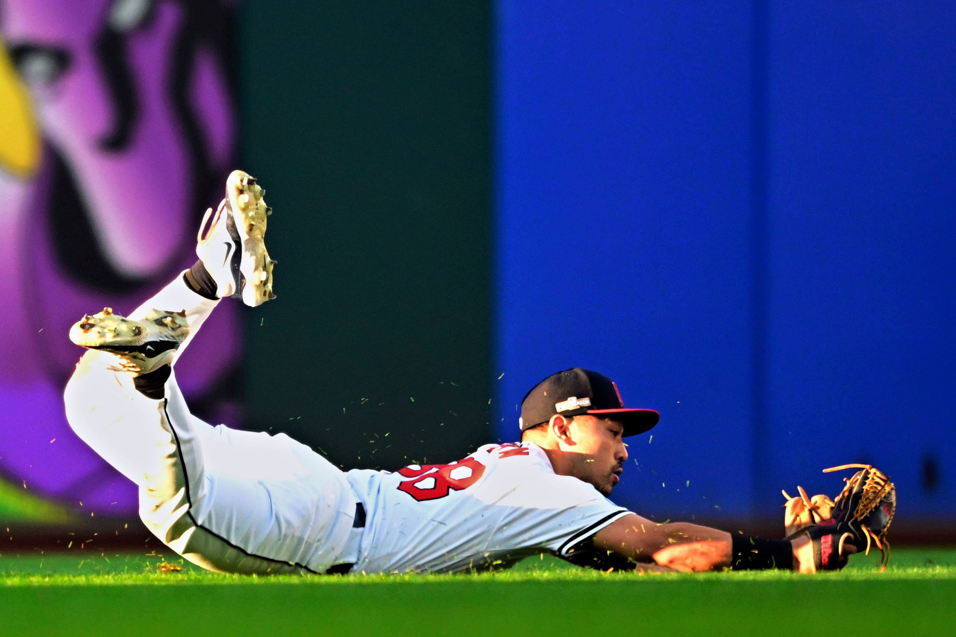 Cleveland Guardians left fielder Steven Kwan makes a diving catch on a fly ball hit by Detroit Tigers' Wenceel Pérez for an out in the eighth inning during Game 2 of baseball's AL Division Series, Monday, Oct. 7, 2024, in Cleveland. (AP Photo/David Dermer)