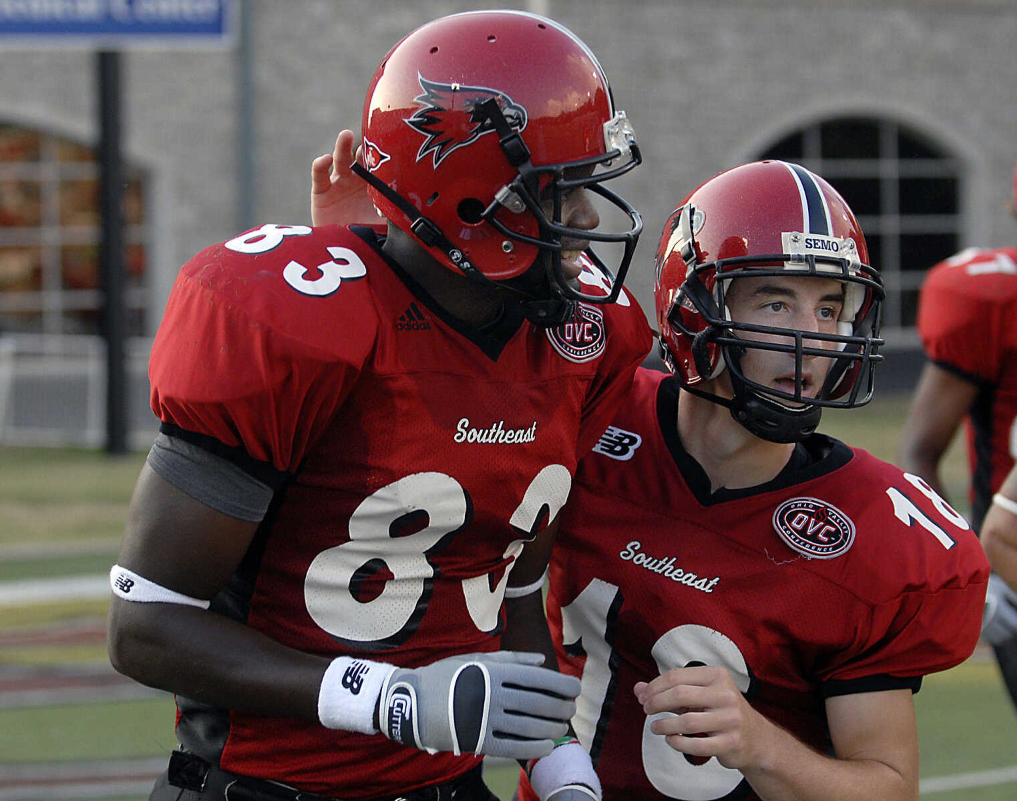 KIT DOYLE ~ kdoyle@semissourian.com
Receiver Chantae Ahamefule, left, and quarterback Matt Scheible head toward the sideline after their touchdown connection in the first quarter Thursday, September 3, 2009, in the season opener at Houck Stadium.