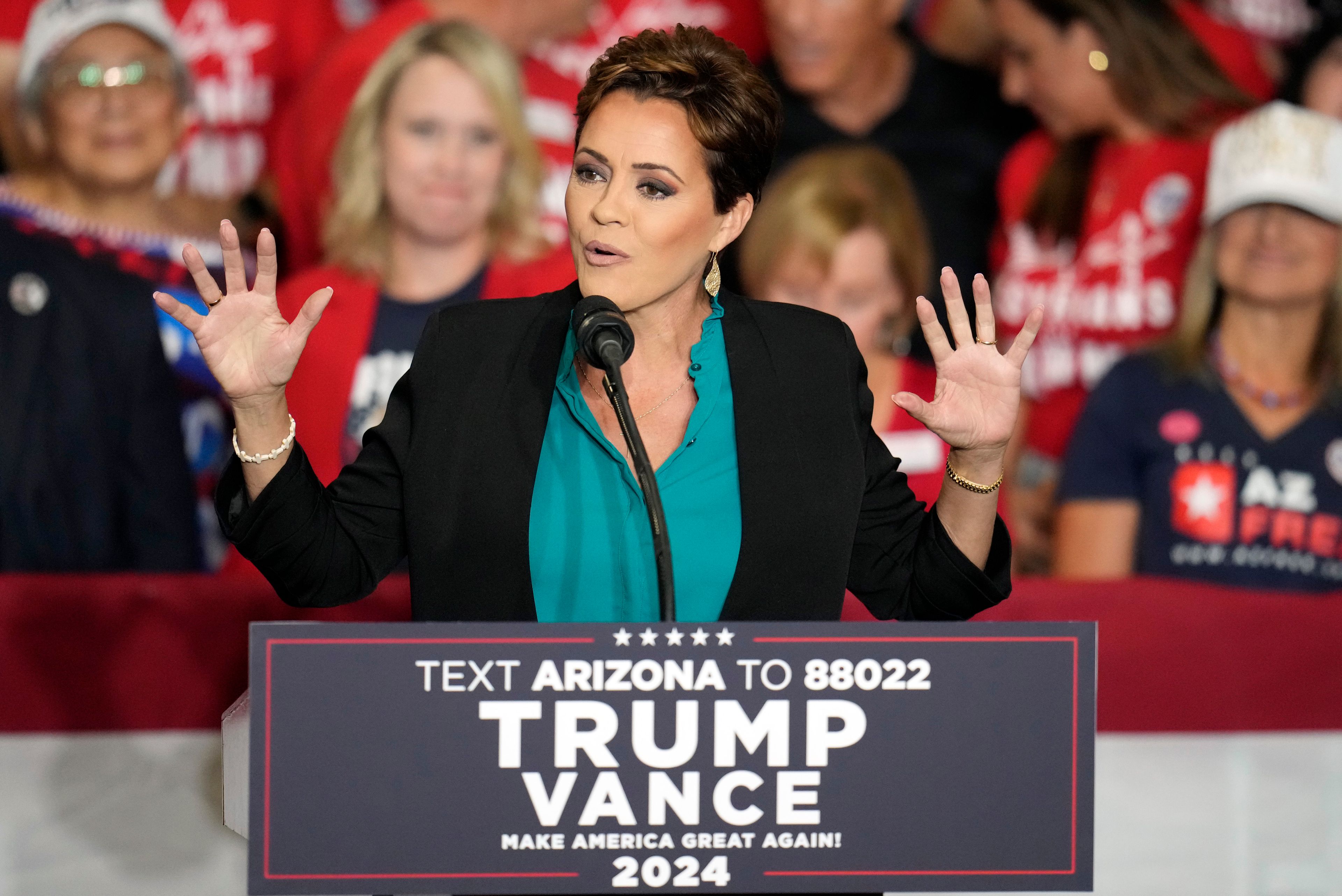 Arizona Senate candidate Kari Lake speaks before Republican vice presidential nominee Sen. JD Vance, R-Ohio, at a campaign rally in Peoria, Ariz., Tuesday, Oct. 22, 2024. (AP Photo/Ross D. Franklin)