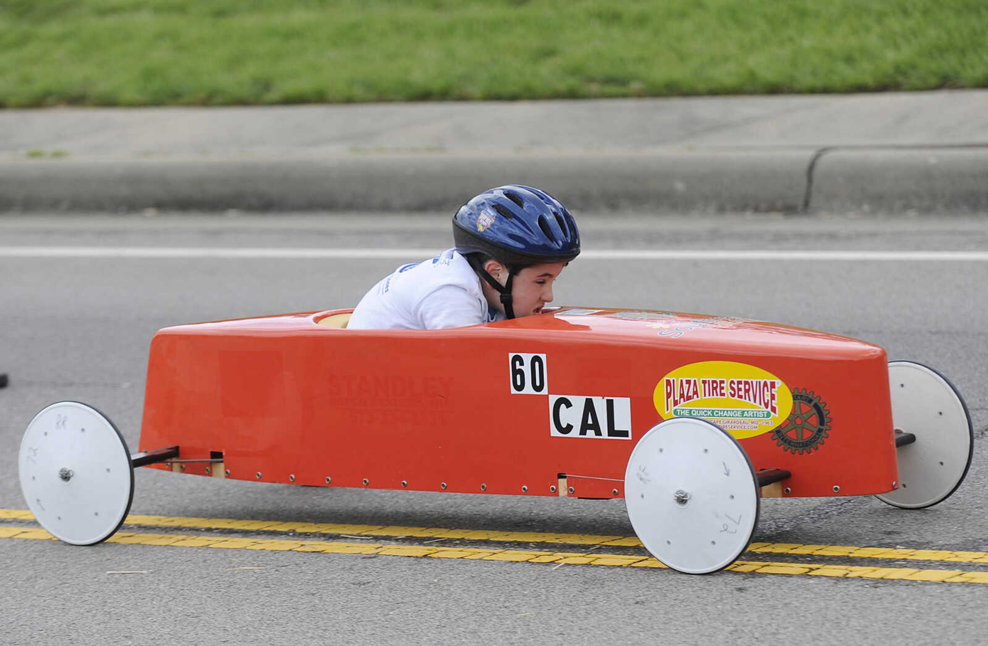 Cal Bertand races down Sprigg Street during the 2013 Soap Box Derby Saturday, May 4, at Blanchard Elementary School, 1829 N. Sprigg St., in Cape Girardeau. Racers ranging in age from 7 to 17 competed in two divisions at the event which is a fundraiser for the Cape Girardeau Rotary Club. The winners in each division will go on to compete in the All-American Soap Box Derby held in Akron, Ohio in July.