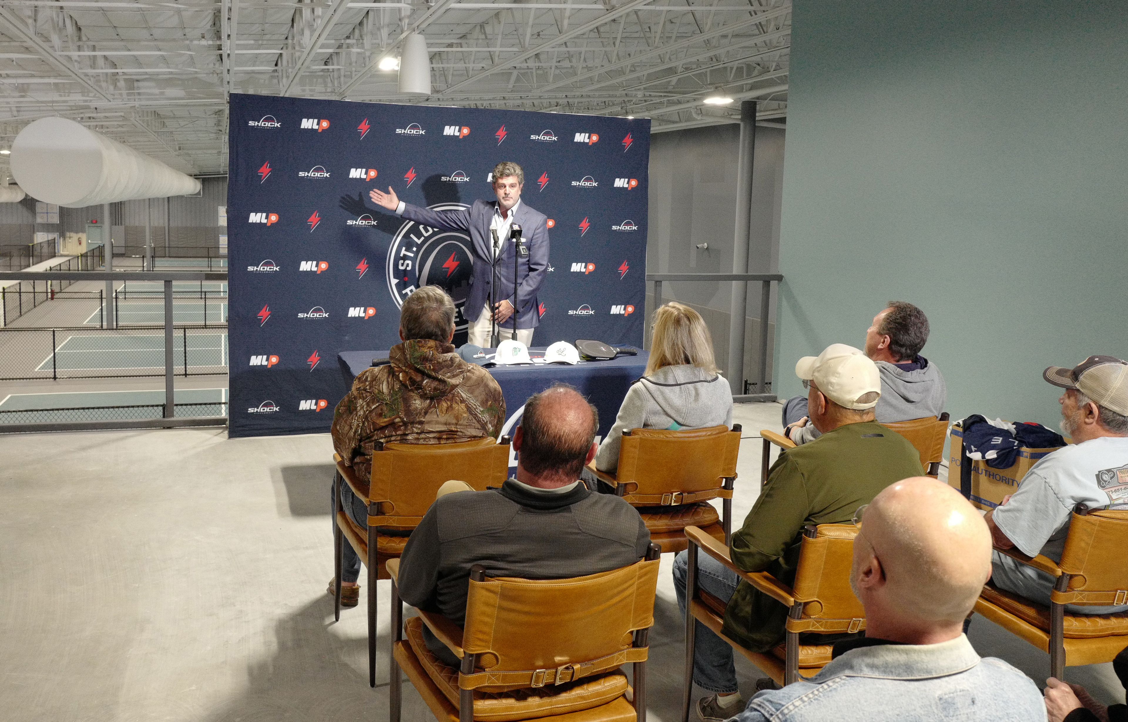 Jeff Brune showcases The Pickleball factory to assembled audience members during an event Wednesday, Nov. 20. The 14-court pickleball facility will open in December.