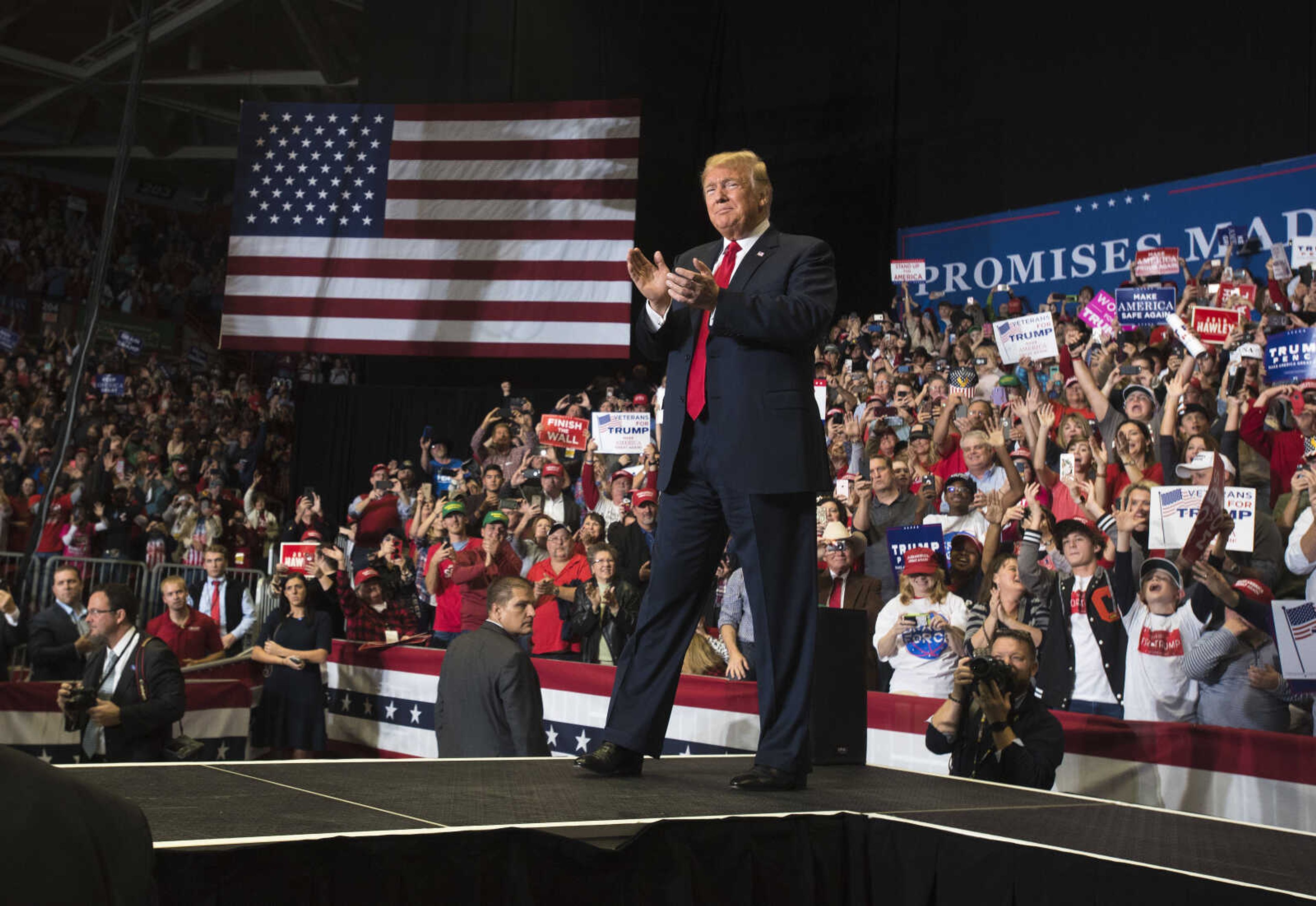 The crowd at the Show Me Center cheers for President Donald Trump as he makes his way to the podium during a Make America Great Again rally Monday, Nov. 5, 2018, in Cape Girardeau.