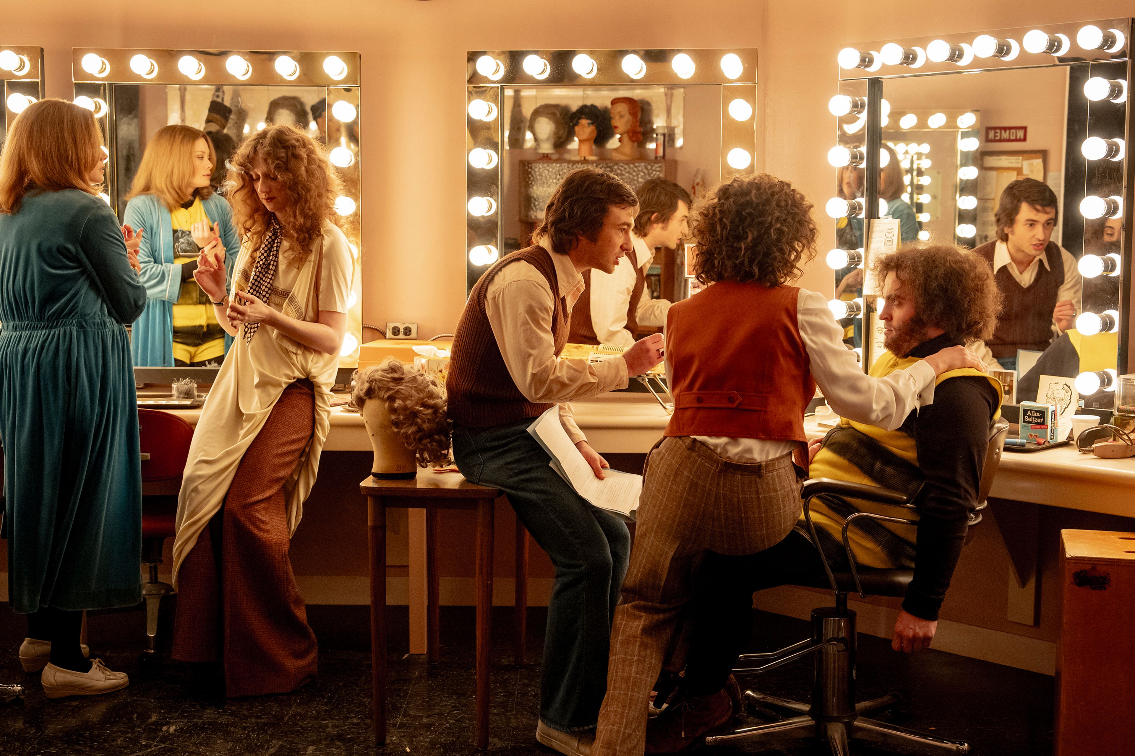 This image released by Sony Pictures shows, from left, Kim Matula, as Jane Curtin, Emily Fairn, as Laraine Newman, Gabriel La Belle, as Lorne Michaels, Rachel Sennott, as Rosie Shuster, and Matt Wood, as John Belushi in a scene from "Saturday Night." (Hopper Stone/Sony Pictures via AP)