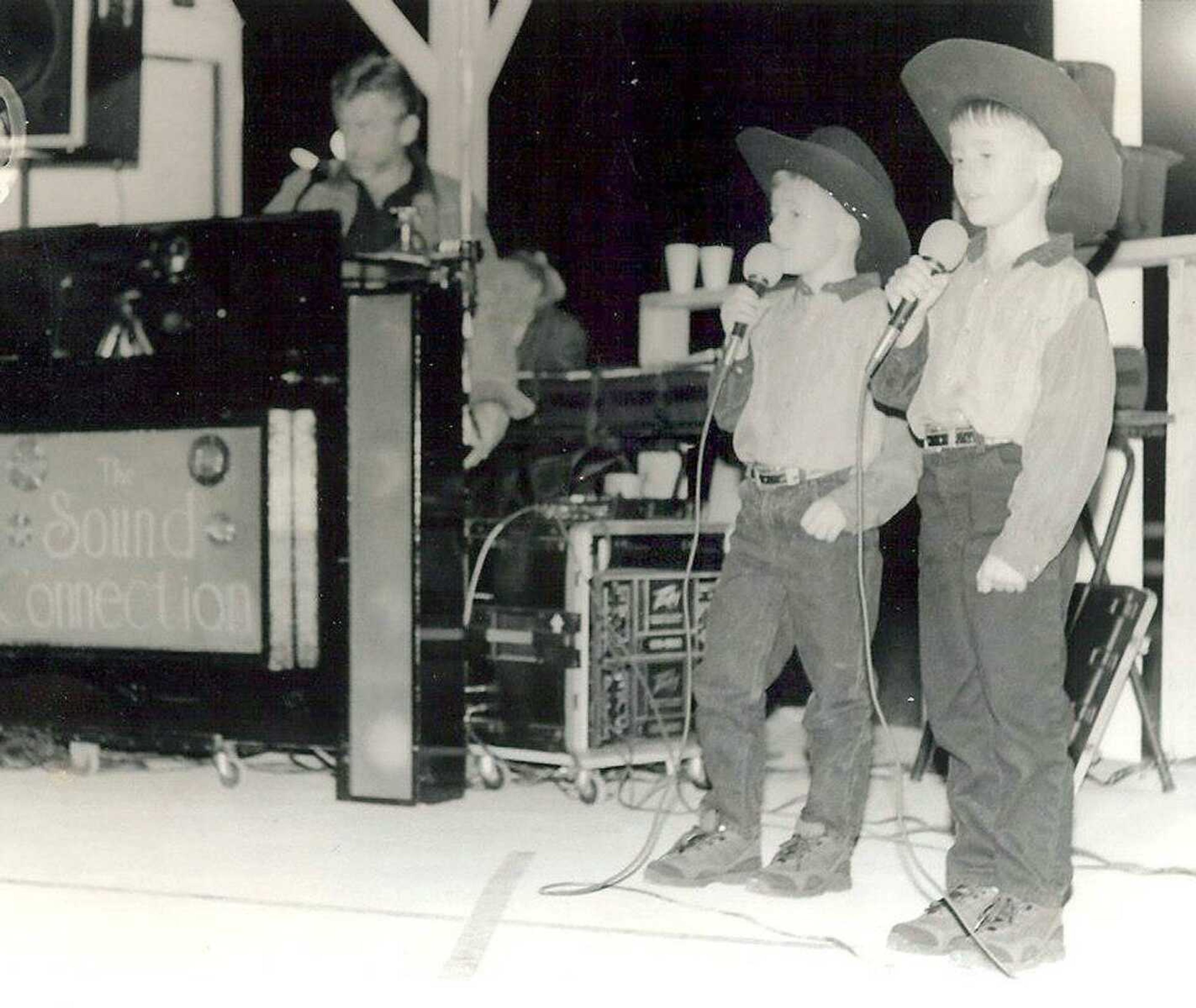 Coty and Clinton Walker on stage as young boys. (Courtesy)