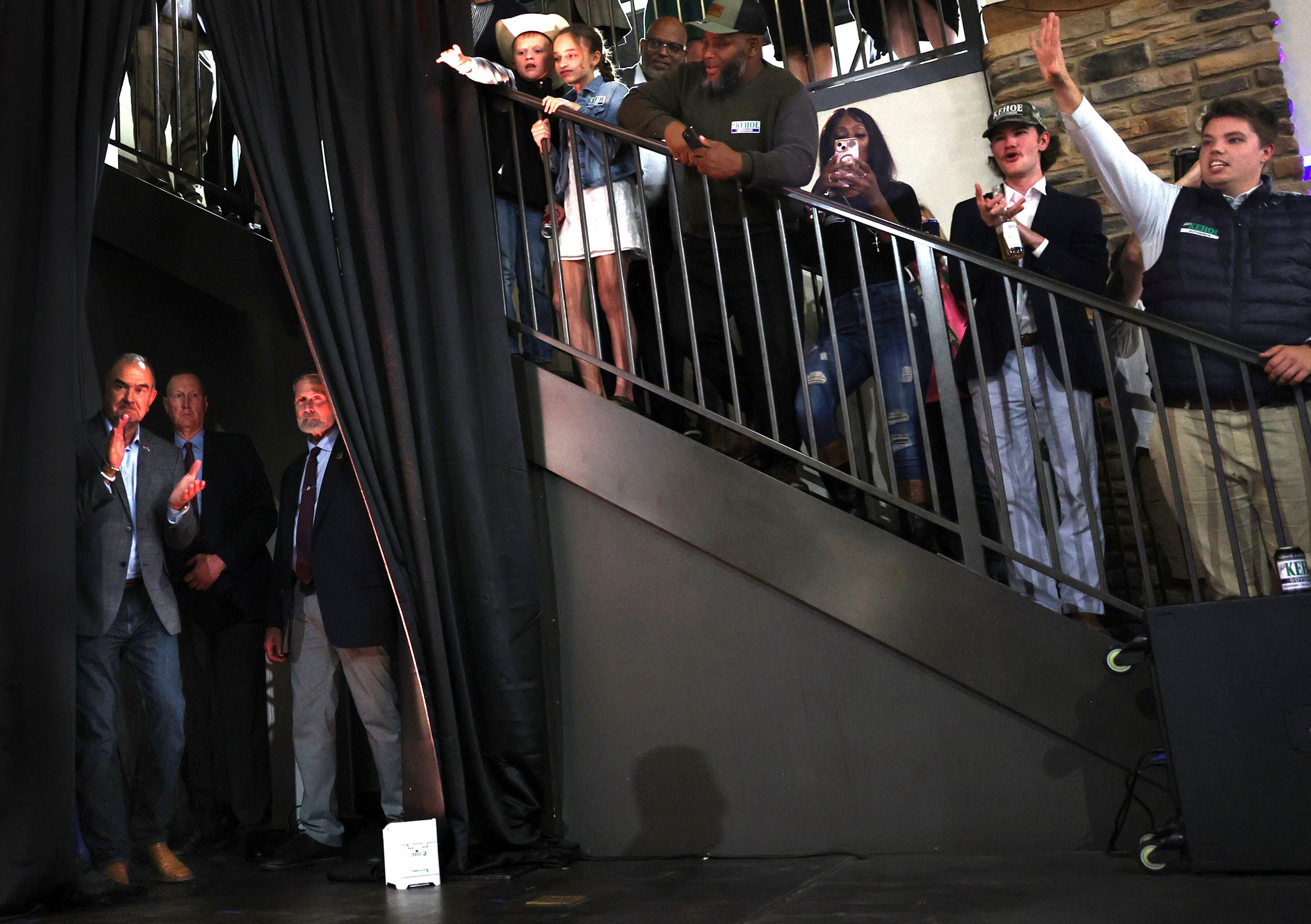 Missouri Governor-elect Mike Kehoe, left, stands backstage as he is introduced as the 58th governor of Missouri at the Capital Bluffs Event Center in Jefferson City, Mo., Tuesday, Nov. 5, 2024. (Robert Cohen/St. Louis Post-Dispatch via AP)