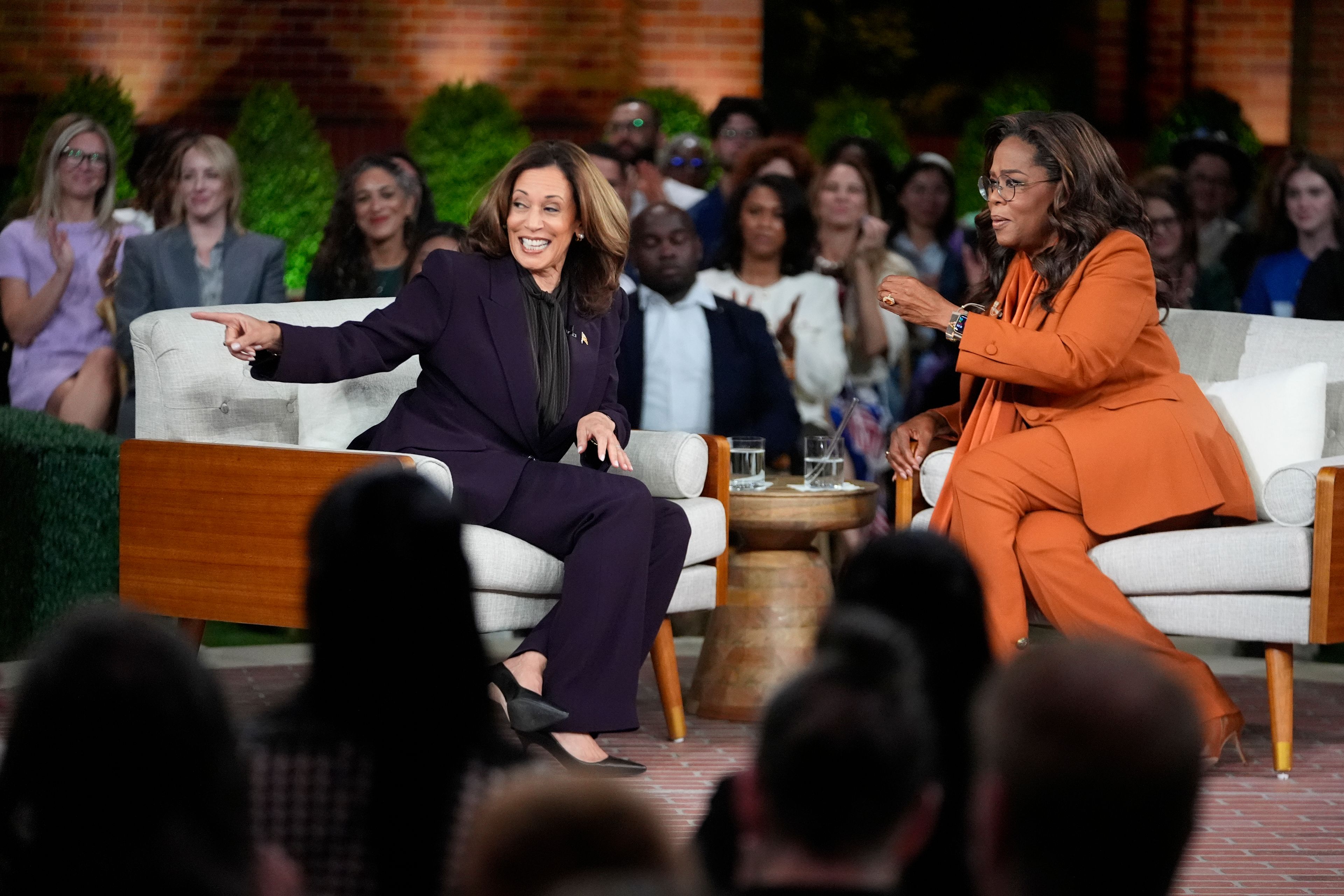 Democratic presidential nominee Vice President Kamala Harris joins Oprah Winfrey at Oprah's Unite for America Live Streaming event Thursday, Sept. 19, 2024 in Farmington Hills, Mich. (AP Photo/Paul Sancya)