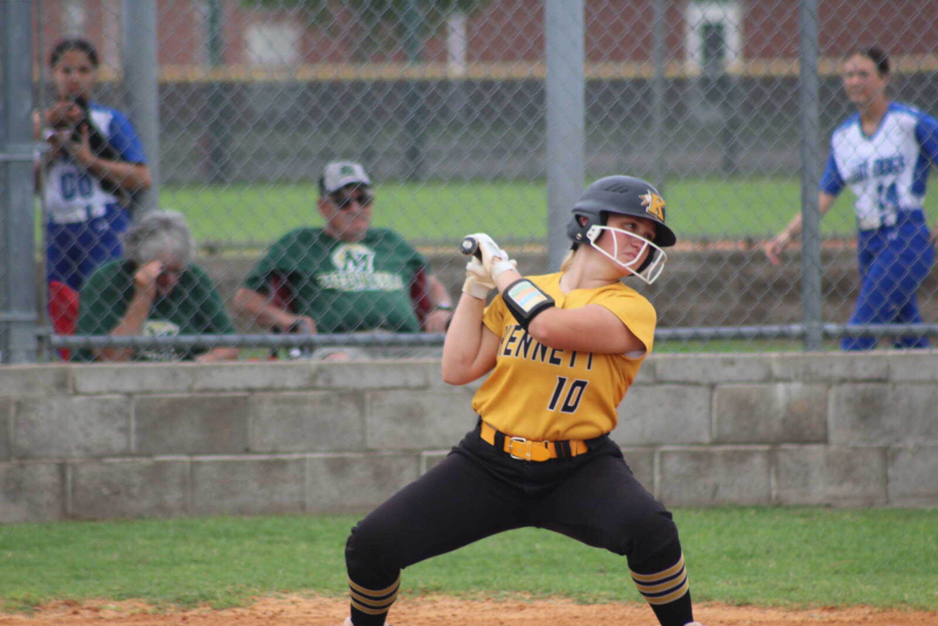 Kennett Lady Indian Emma Claire Bodkin avoids a little chin music Monday at the C2D1 Tournament at Malden. 