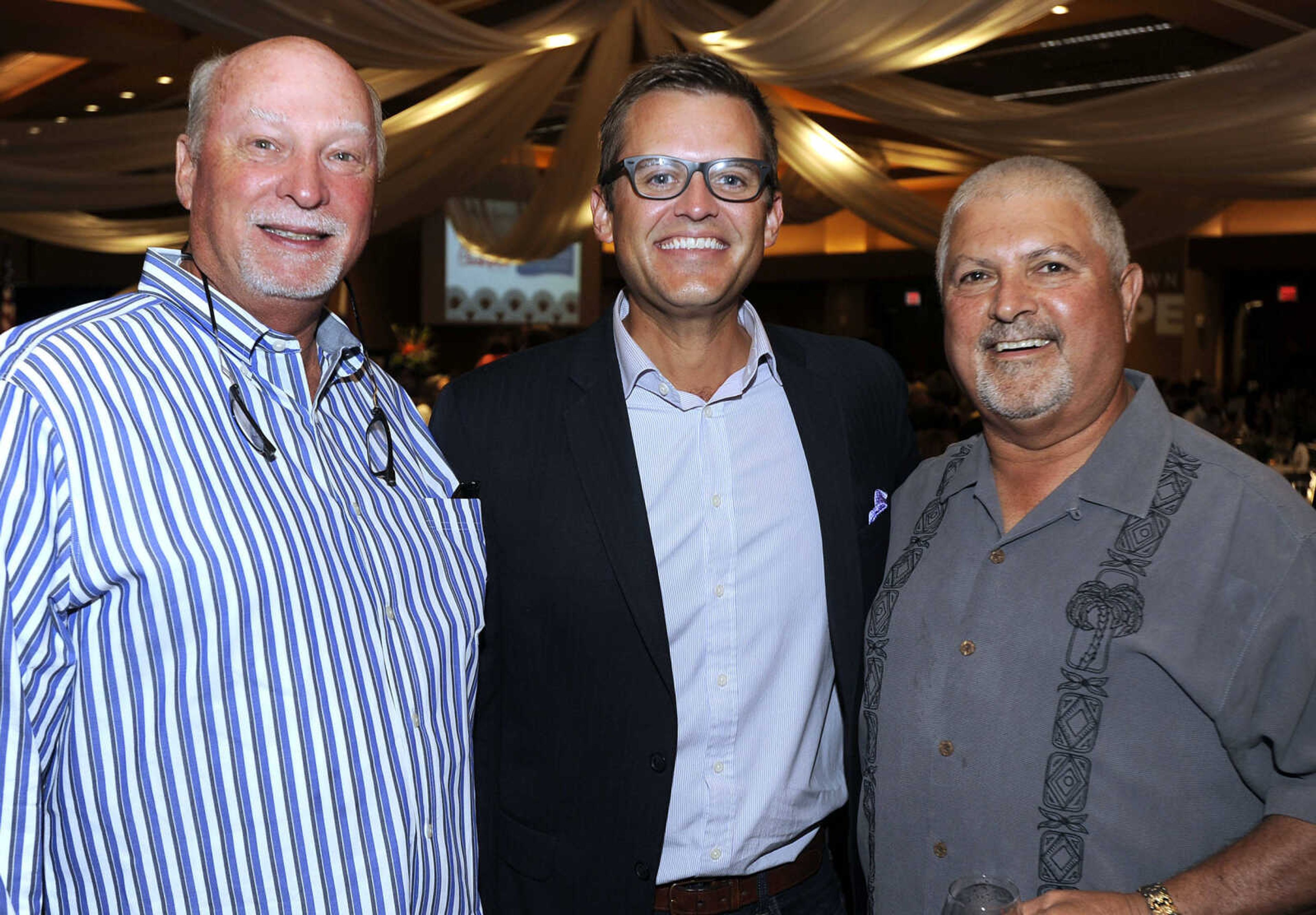 FRED LYNCH ~ flynch@semissourian.com
Mark Proffer, left, Andrew Moore and Bob Fox pose for a photo Saturday, Sept. 9, 2017 at the Charles L. Hutson Auction benefiting Old Town Cape at Isle Casino Cape Girardeau Event Center.