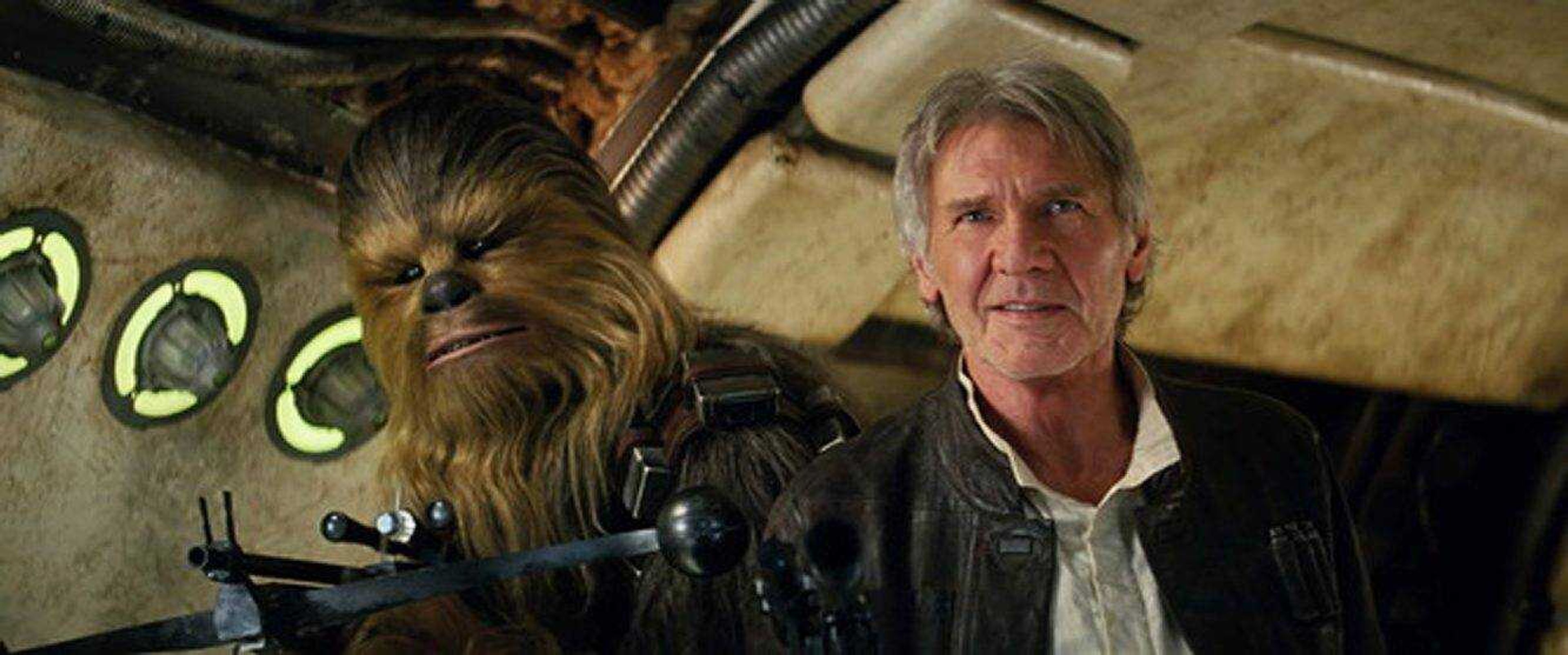 Peter Mayhew portrays Chewbacca and Harrison Ford portrays Han Solo in "Star Wars: The Force Awakens," directed by J.J. Abrams. The movie grossed more than $200 million during the weekend. (Film Frame/Lucasfilm via AP)