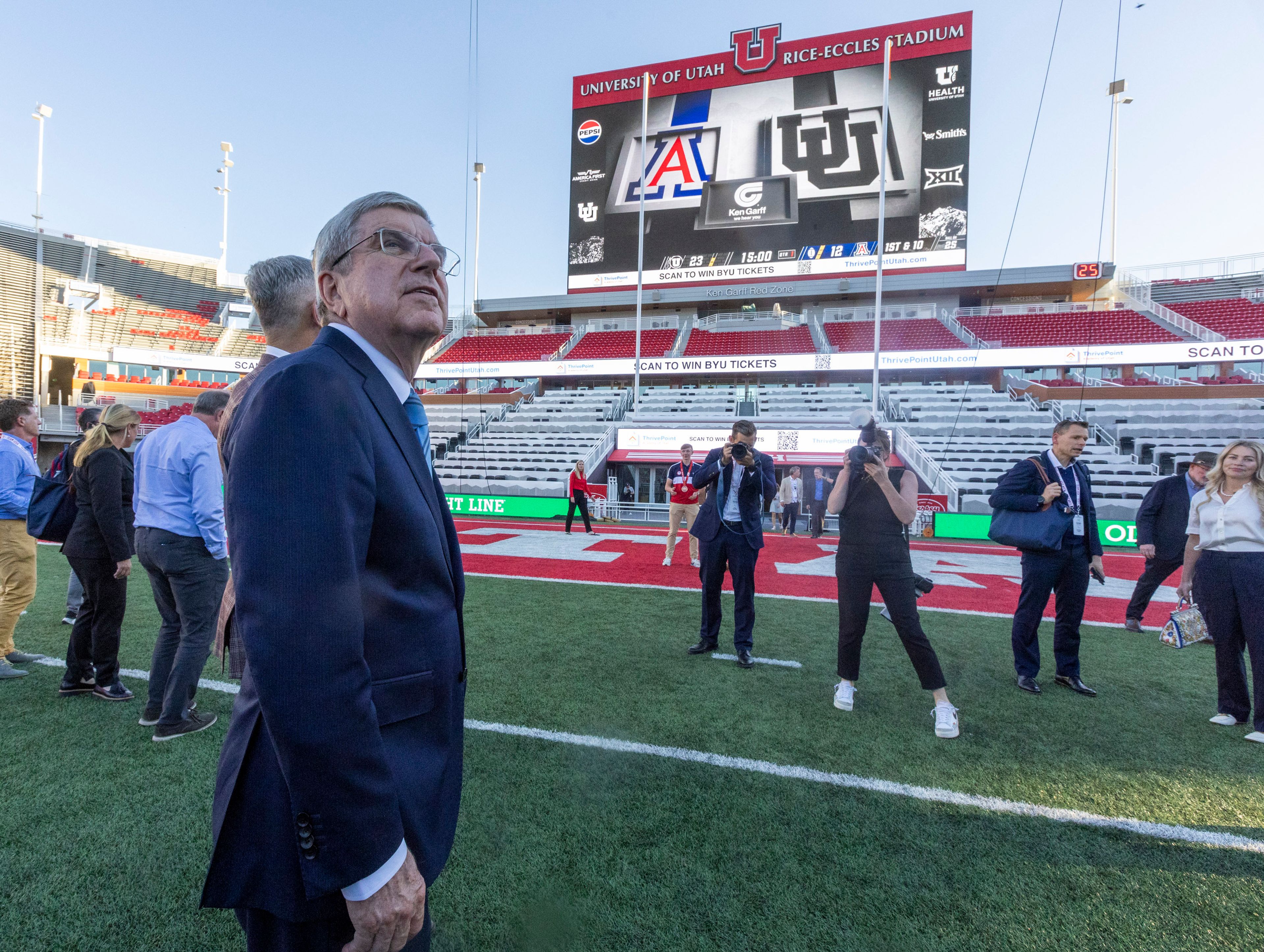 International Olympic Committee President Thomas Bach tours University of Utah's Rice-Eccles Stadium as he leads a delegation visiting ahead of the 2034 Winter Olympics, on the campus of the university in Salt Lake City on Friday, Sept. 27, 2024. (Brice Tucker/The Deseret News via AP)