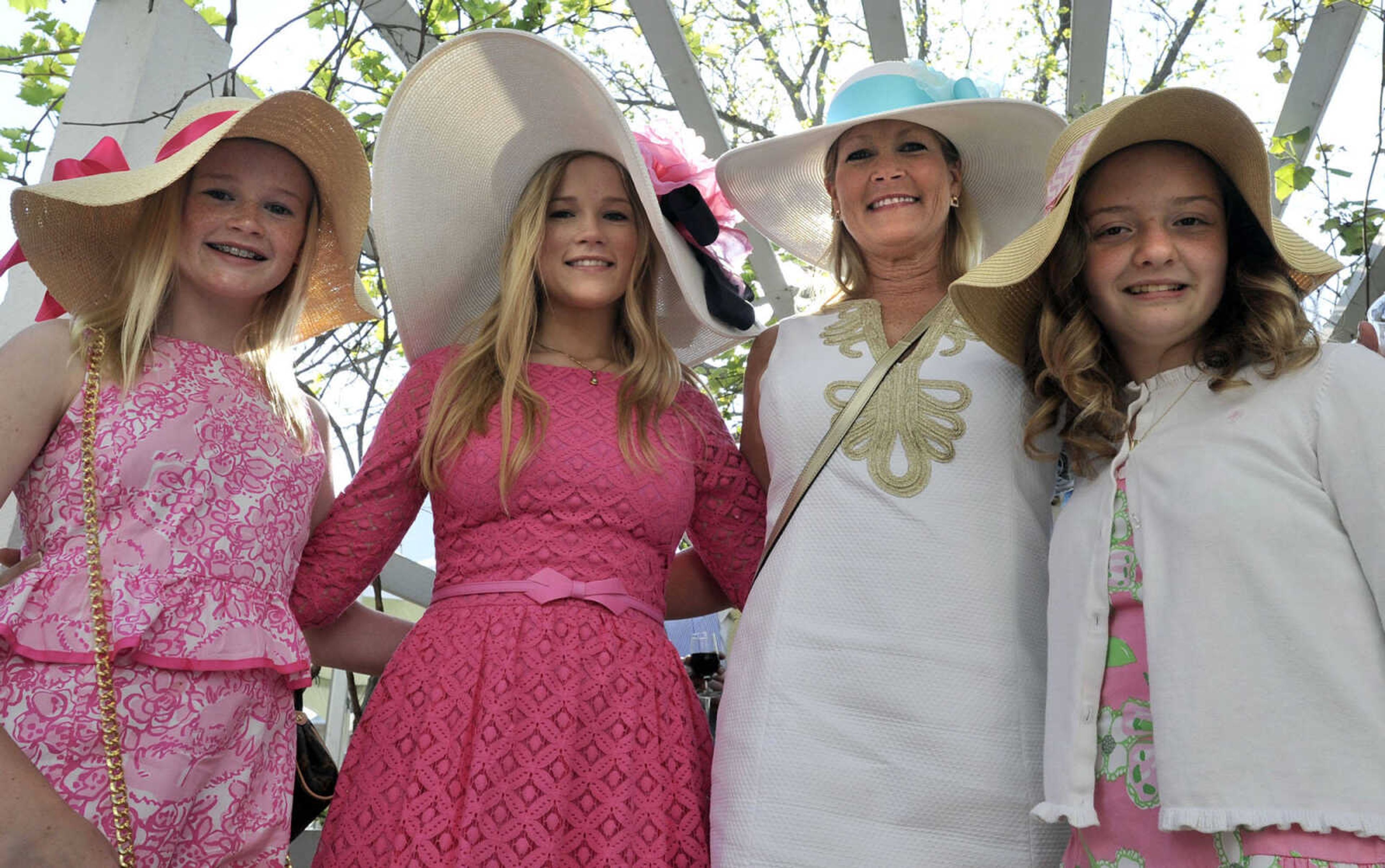 Lexis Edwards, left, Natalee Edwards, Diane Edwards and Paige Gershuny pose for a photo at the Derby Party fundraiser for Big Brothers Big Sisters of Eastern Missouri on Saturday, May 3, 2014 at the Glenn House in Cape Girardeau.