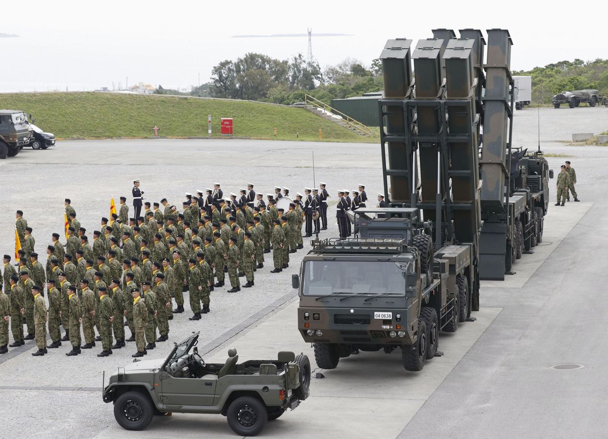 Japan's Cabinet OKs record defense budget that aims to deter...