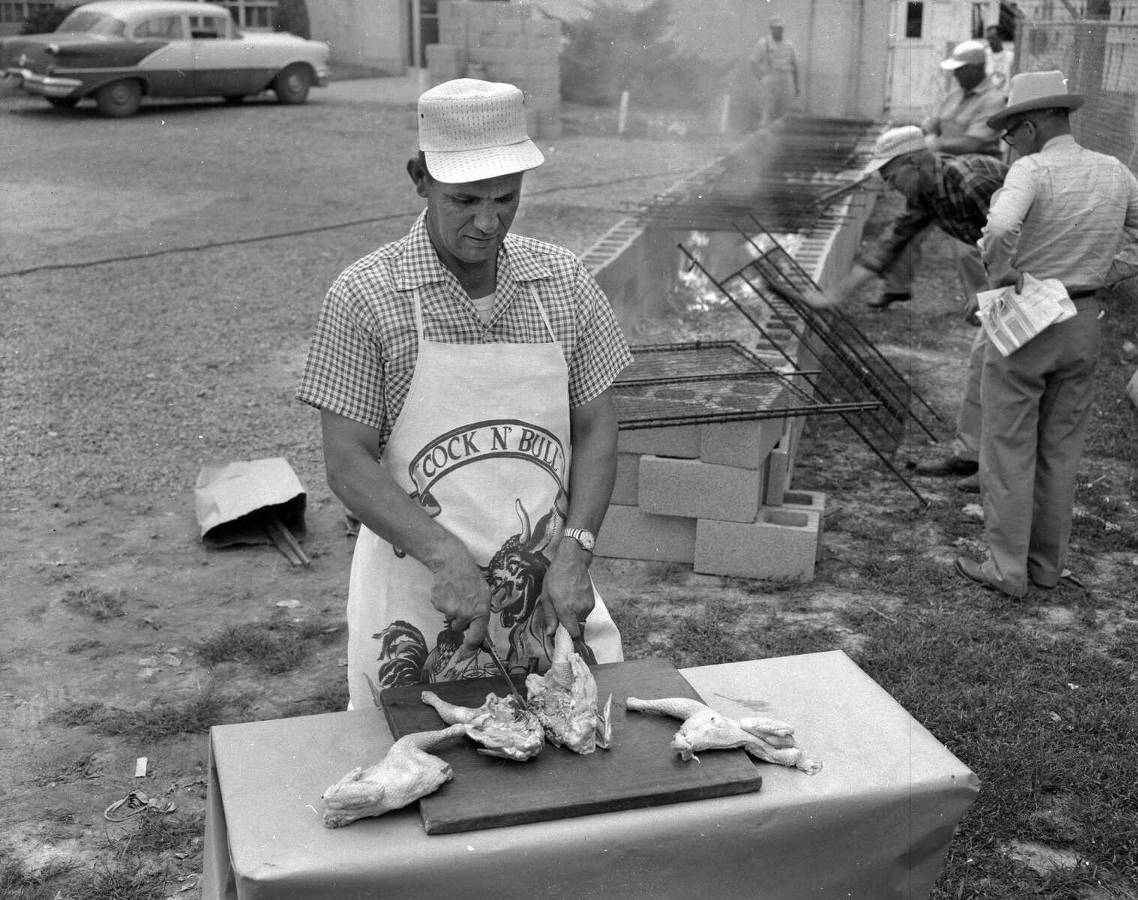 Cape County Poultry Improvement Association and the Cape Girardeau Chamber of Commerce served charcoal barbecued chicken from an open, concrete-block pit, 65 feet long, at Arena Park on Oct. 3, 1957.