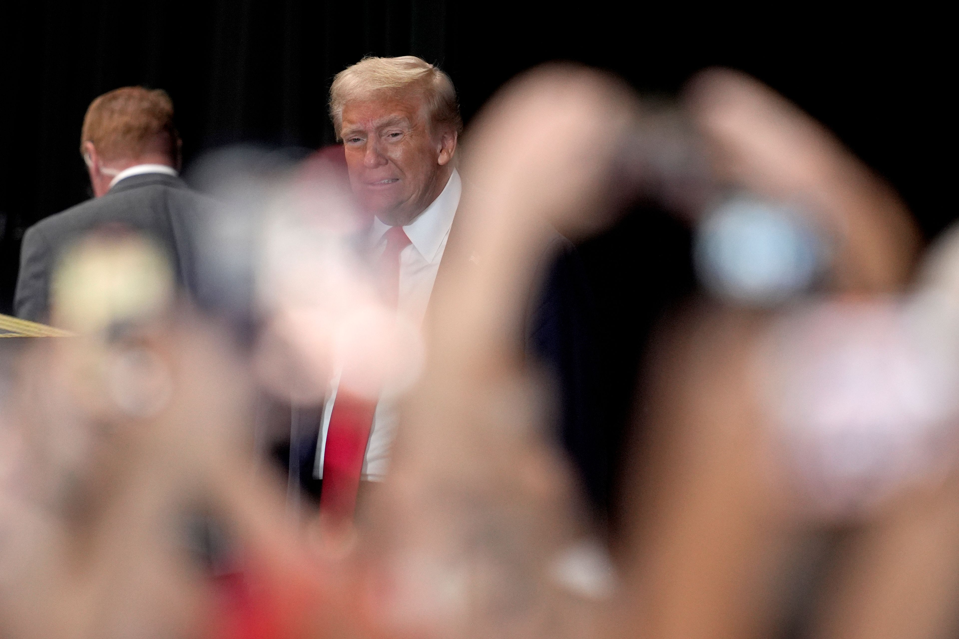 Republican presidential nominee former President Donald Trump arrives to speak at a campaign event at Beauty Society, Saturday, Oct. 12, 2024, in North Las Vegas, Nev. (AP Photo/John Locher)