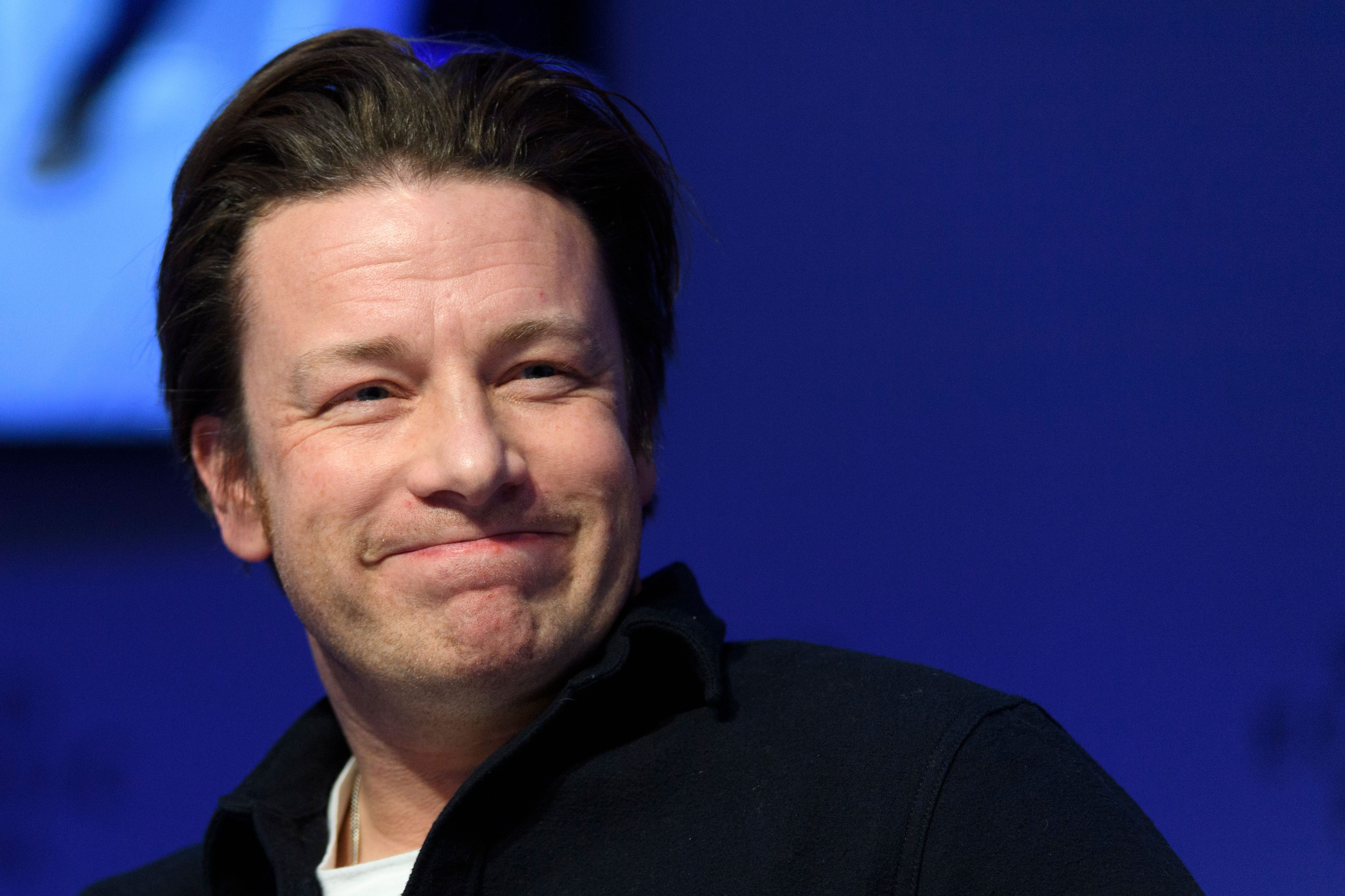 FILE - British chef Jamie Oliver attends a panel session during the 47th annual meeting of the World Economic Forum, WEF, in Davos, Switzerland, Jan. 18, 2017. (Laurent Gillieron/Keystone via AP, file)