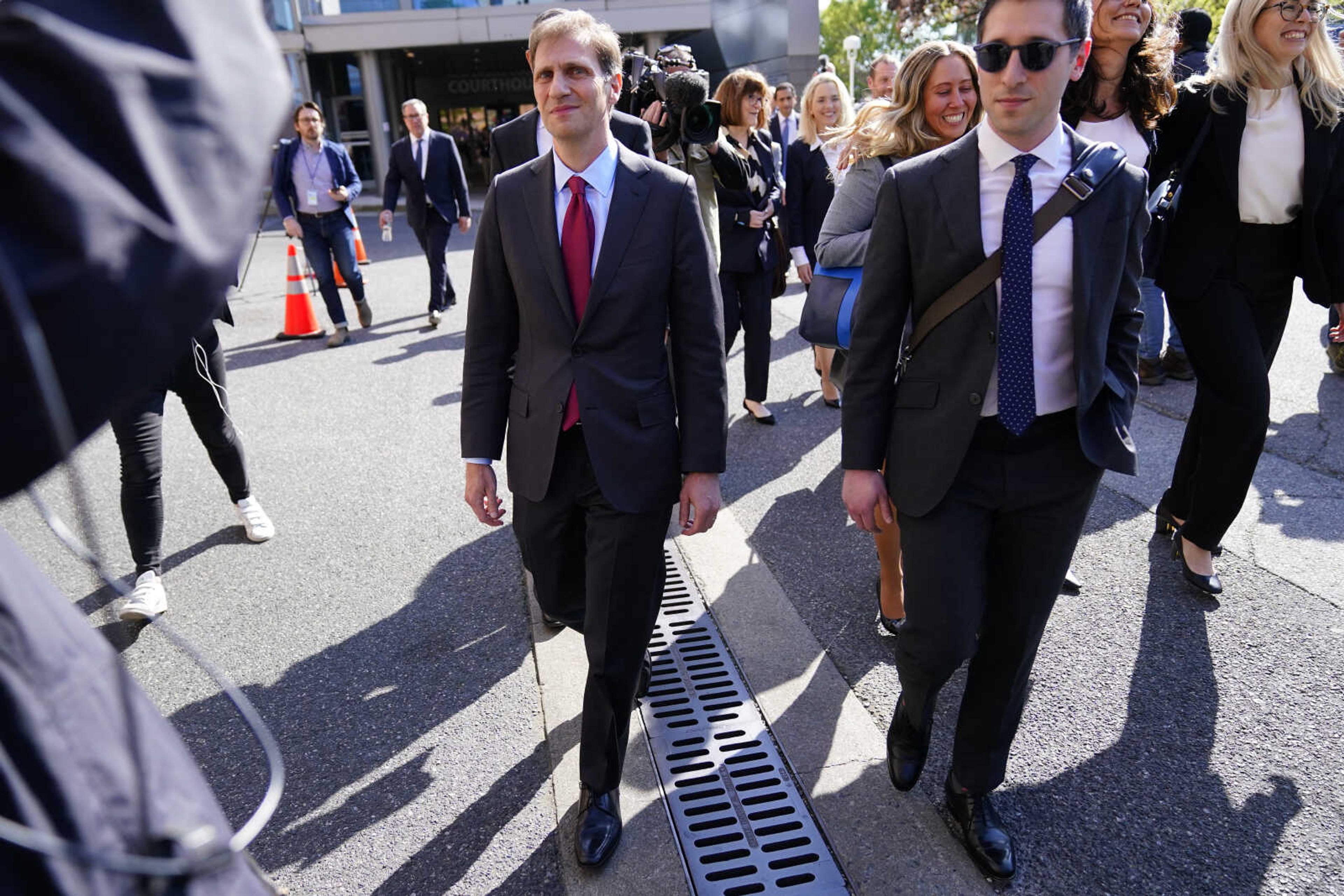 Attorney Justin Nelson, representing Dominion Voting Systems, walks after a news conference outside New Castle County Courthouse in Wilmington, Del., after the defamation lawsuit by Dominion Voting Systems against Fox News was settled just as the jury trial was set to begin, Tuesday, April 18, 2023. (AP Photo/Matt Rourke)