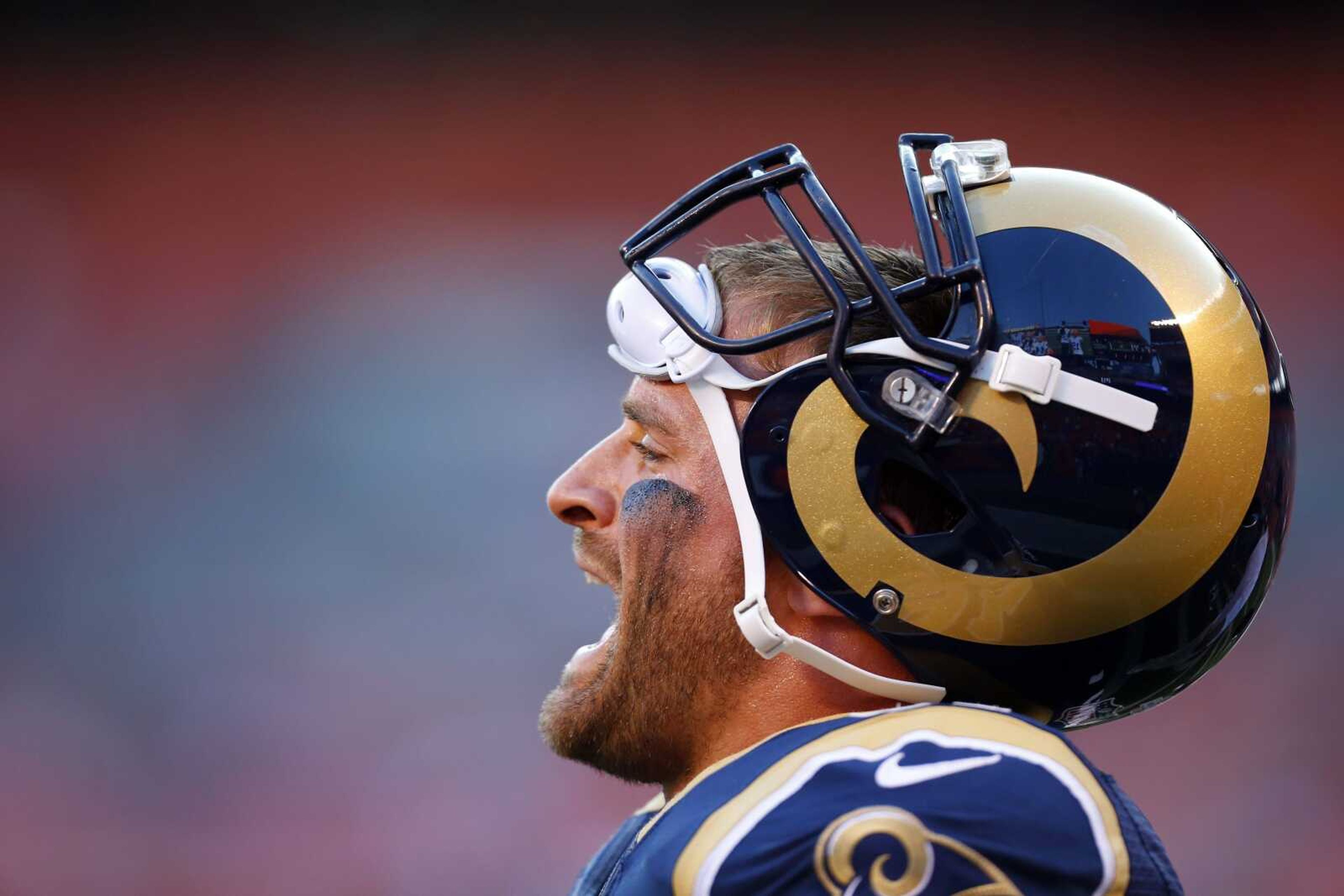 St. Louis Rams defensive end Chris Long yells at his teammates during pregame before a preseason game last month against the host Cleveland Browns. (Jeff Haynes ~ Associated Press)