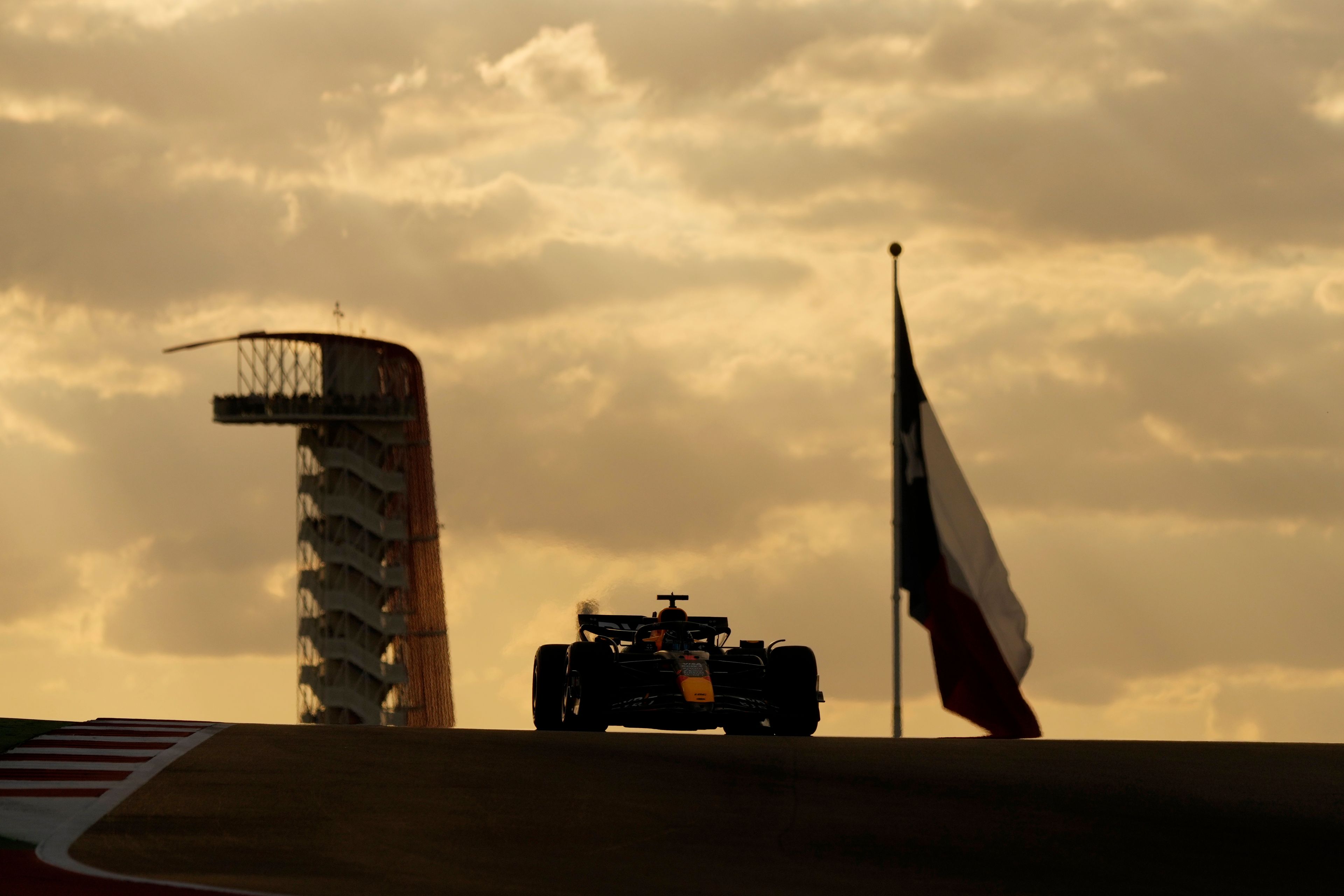 Red Bull driver Max Verstappen, of the Netherlands, tops a hill during a qualifying session for the Formula One U.S. Grand Prix auto race at Circuit of the Americas, Saturday, Oct. 19, 2024, in Austin, Texas. (AP Photo/Eric Gay)