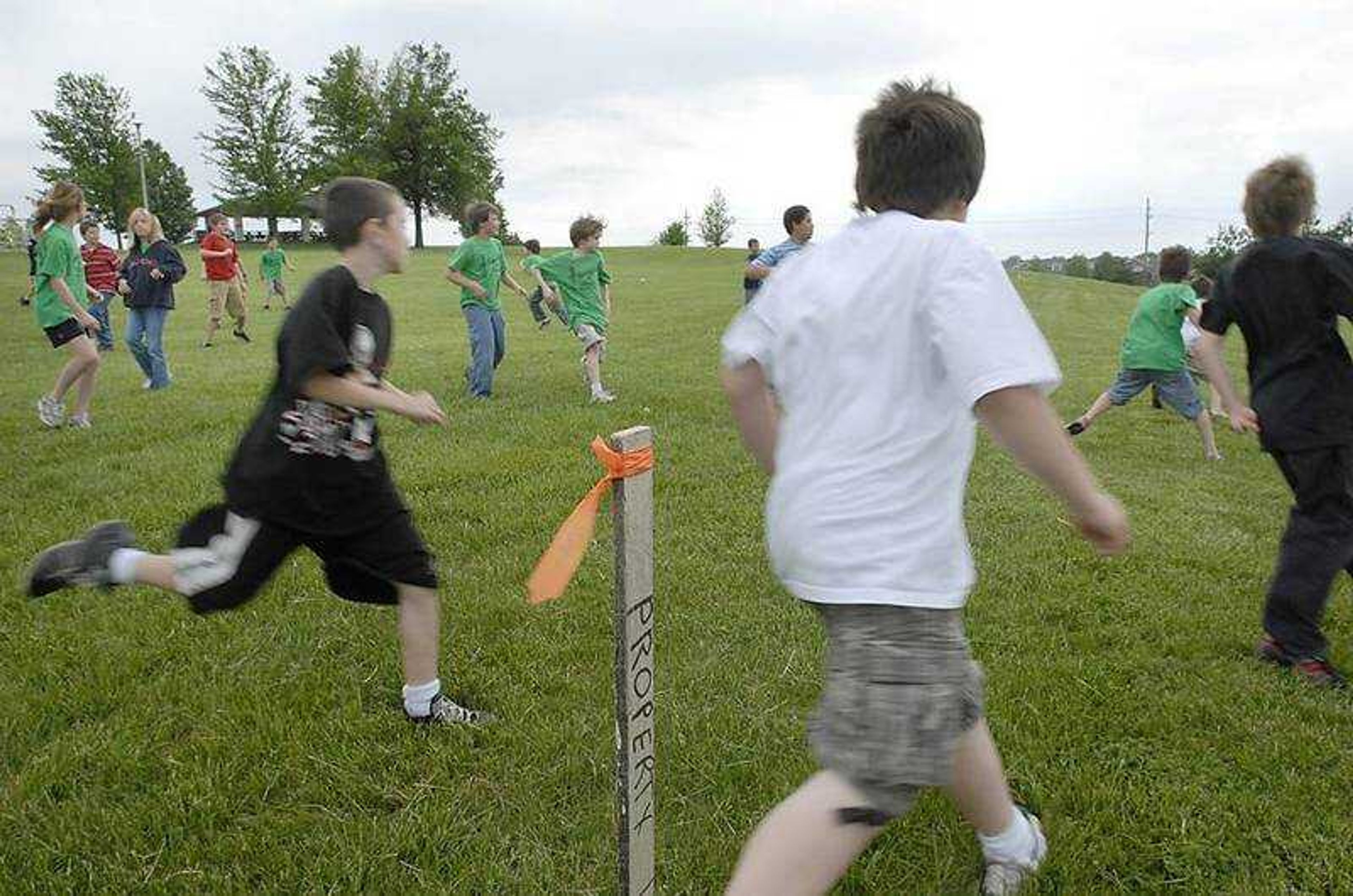 KIT DOYLE ~ kdoyle@semissourian.com
The football game of fourth graders from West Lane Elementary took them past the property line at Cape Girardeau County Park North Wednesday, May 7, 2008 that the County Commission is selling to Drury Corp.