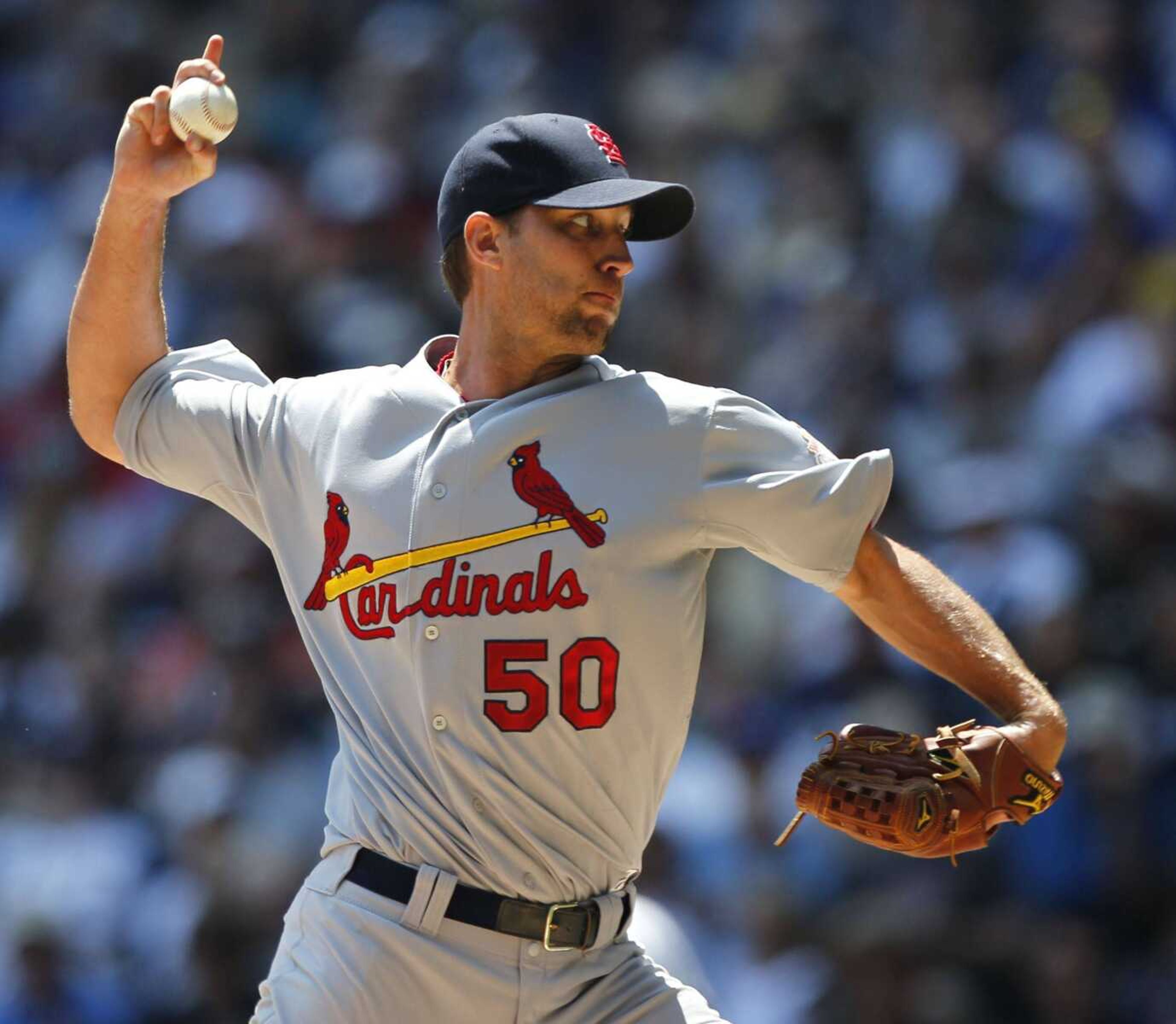 Cardinals starting pitcher Adam Wainwright delivers during the first inning Wednesday in Milwaukee. (JEFFREY PHELPS ~ Associated Press)