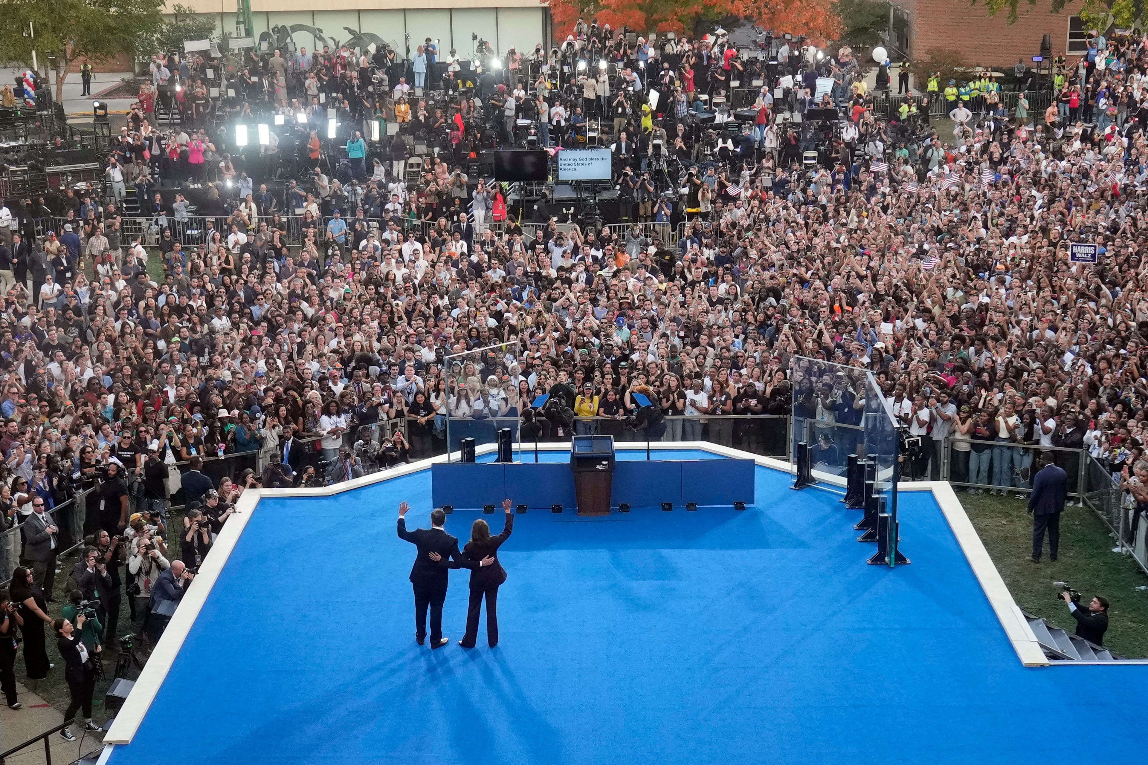 Vice President Kamala Harris, right, and her husband, second gentleman Doug Emhoff, wave after her concession speech for the 2024 presidential election on the campus of Howard University in Washington, Wednesday, Nov. 6, 2024. (AP Photo/David J. Phillip)