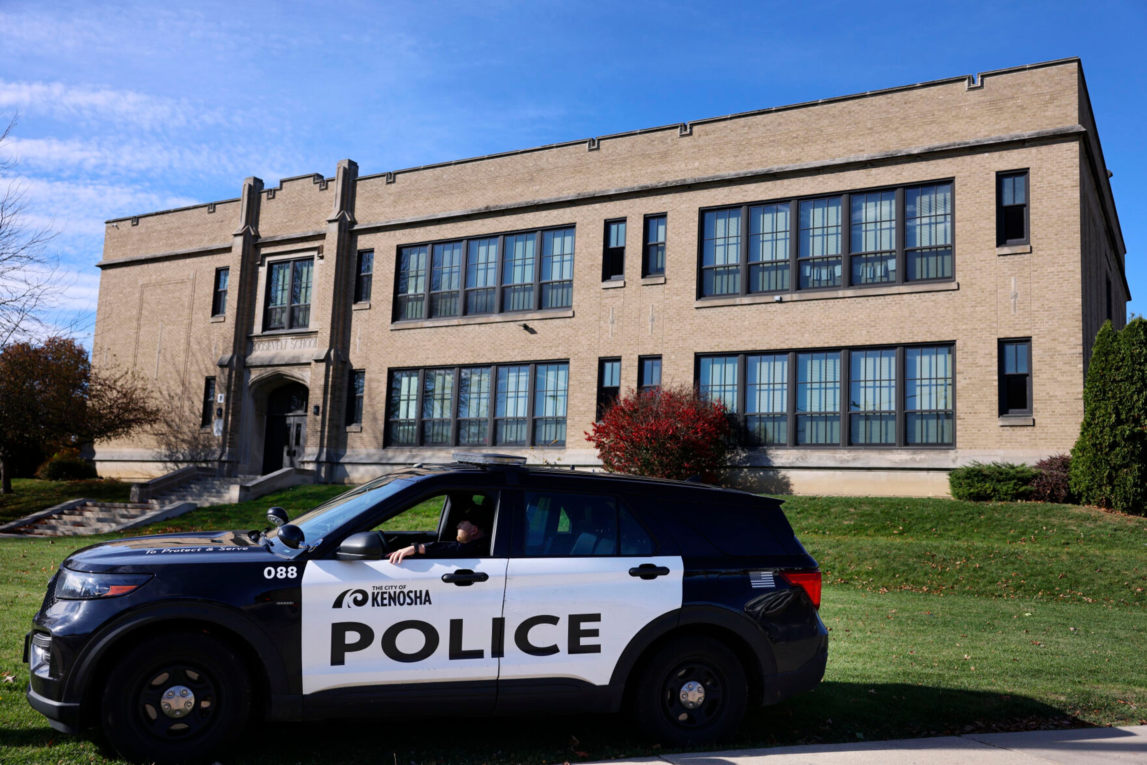 The Kenosha Police Department is parked in front of Roosevelt Elementary School on Thursday, Nov. 7, 2024 in Kenosha, Wis. (Sean Krajacic/The Kenosha News via AP)