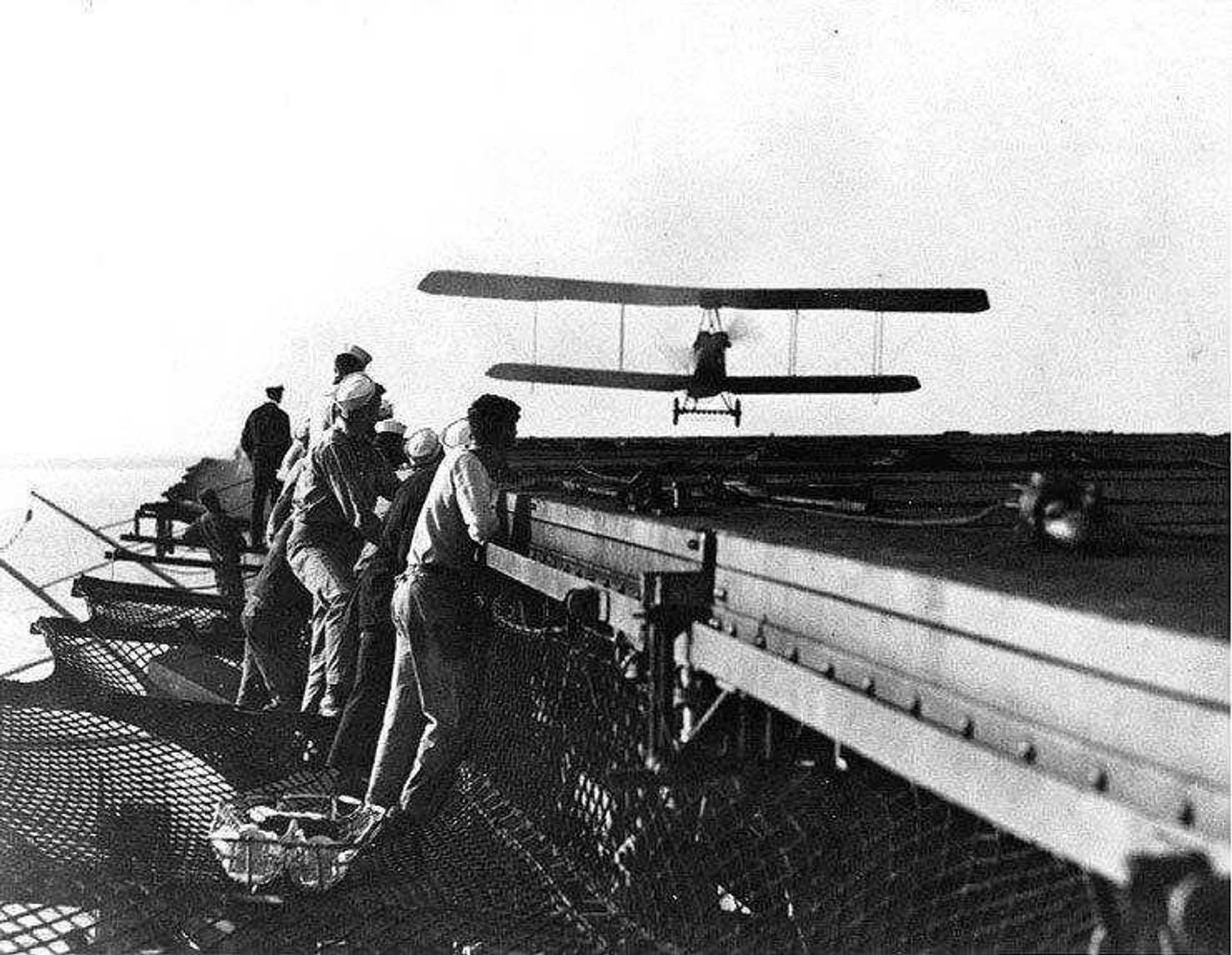 An Aeromarine 39-B airplane approaches the flight deck of the U.S.S. Langley during landing practice on Oct. 19, 1922. (Photo courtesy of the 100th Anniversary of Naval Aviation Foundation)