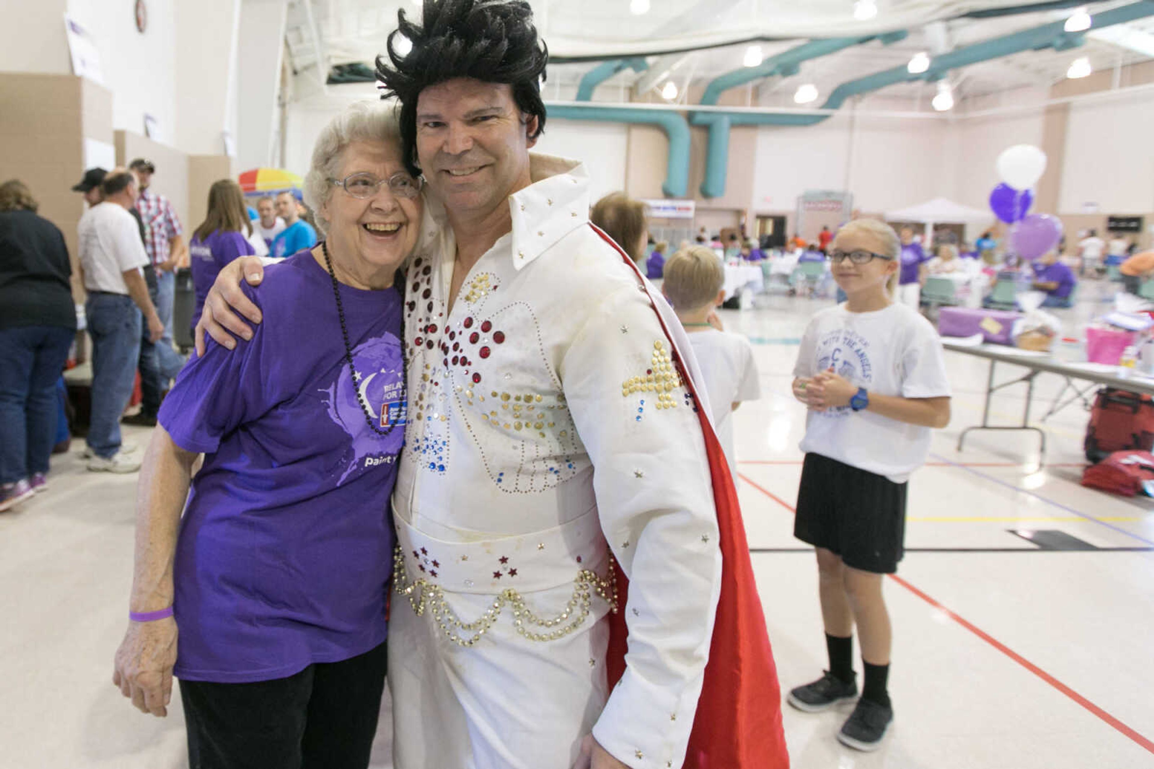 GLENN LANDBERG ~ glandberg@semissourian.com


Frieda Seyer poses for a photo with Scott Givens, the master of ceremonies for the event at the Relay for Life of Cape Girardeau County fundraiser in the Osage Centre, Saturday, May 7, 2016.