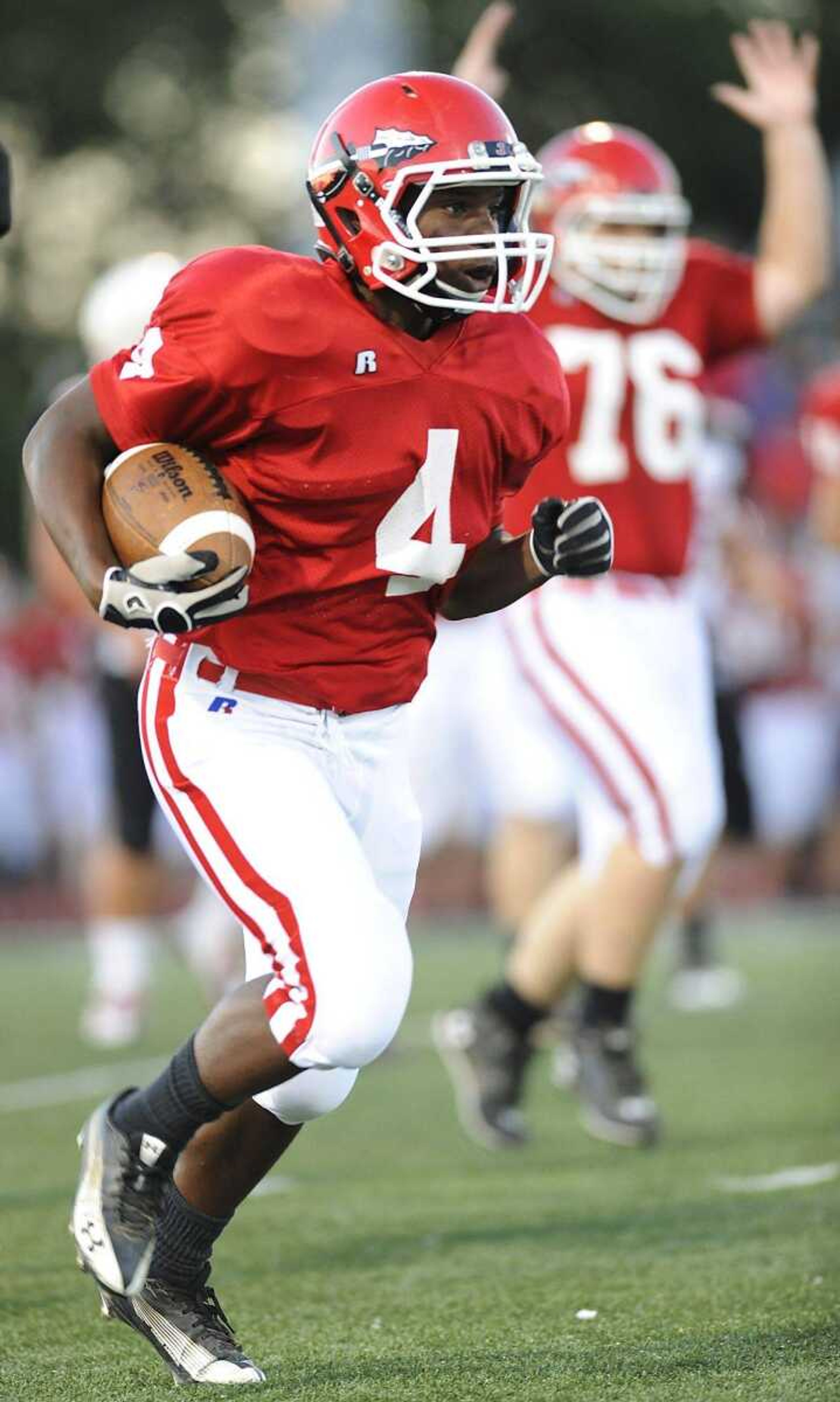 Jackson's Jamont Stuckey returns an interception against Fox during Friday's jamboree in Hillsboro, Mo. (ADAM VOGLER)