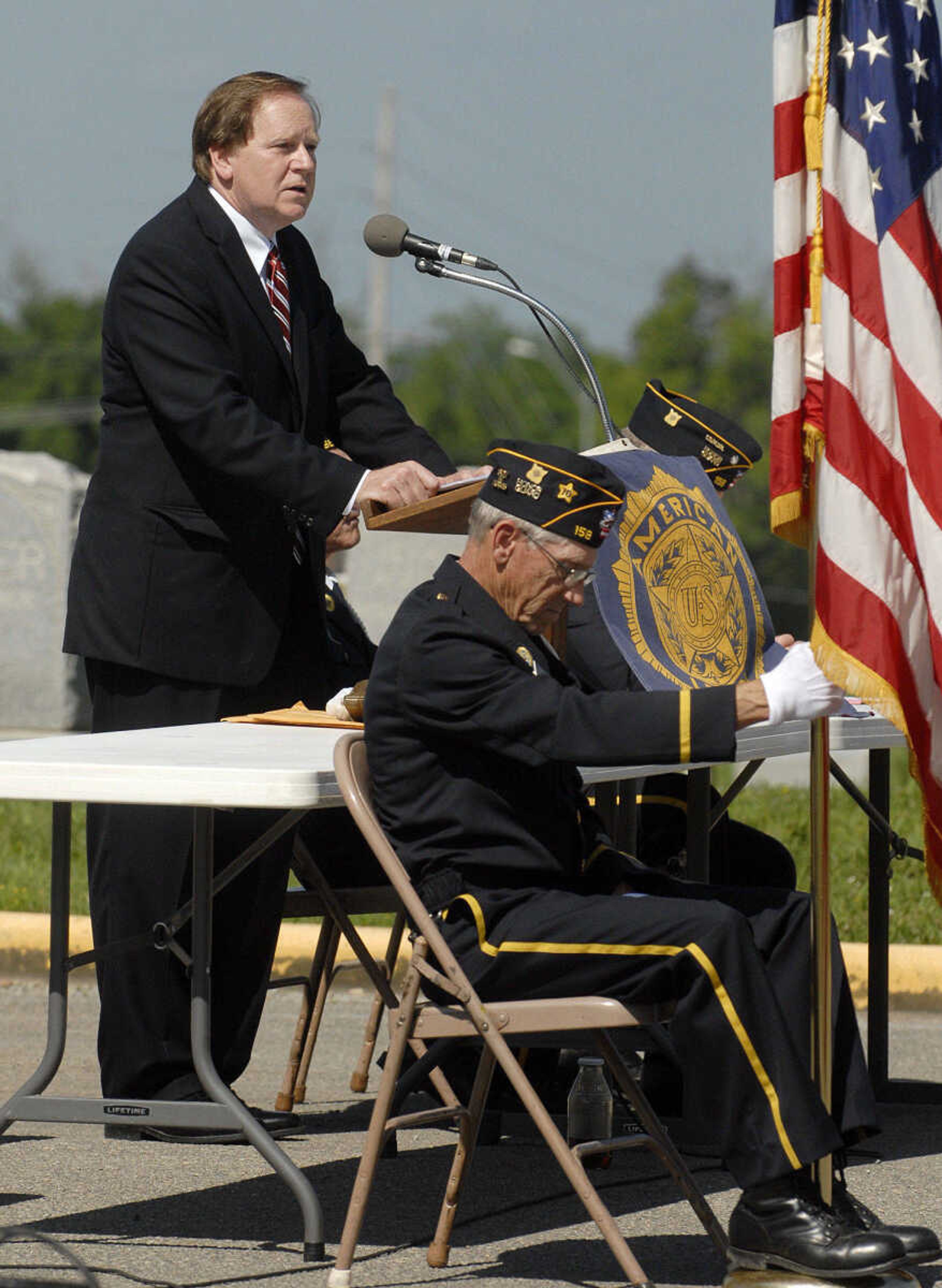 LAURA SIMON~lsimon@semissourian.com
Guest speaker Assistant U.S. Attorney for the Department of Justice Larry Ferrell speaks at the Memorial Day program Monday, May 30, 2011 at the Jackson Cemetery.