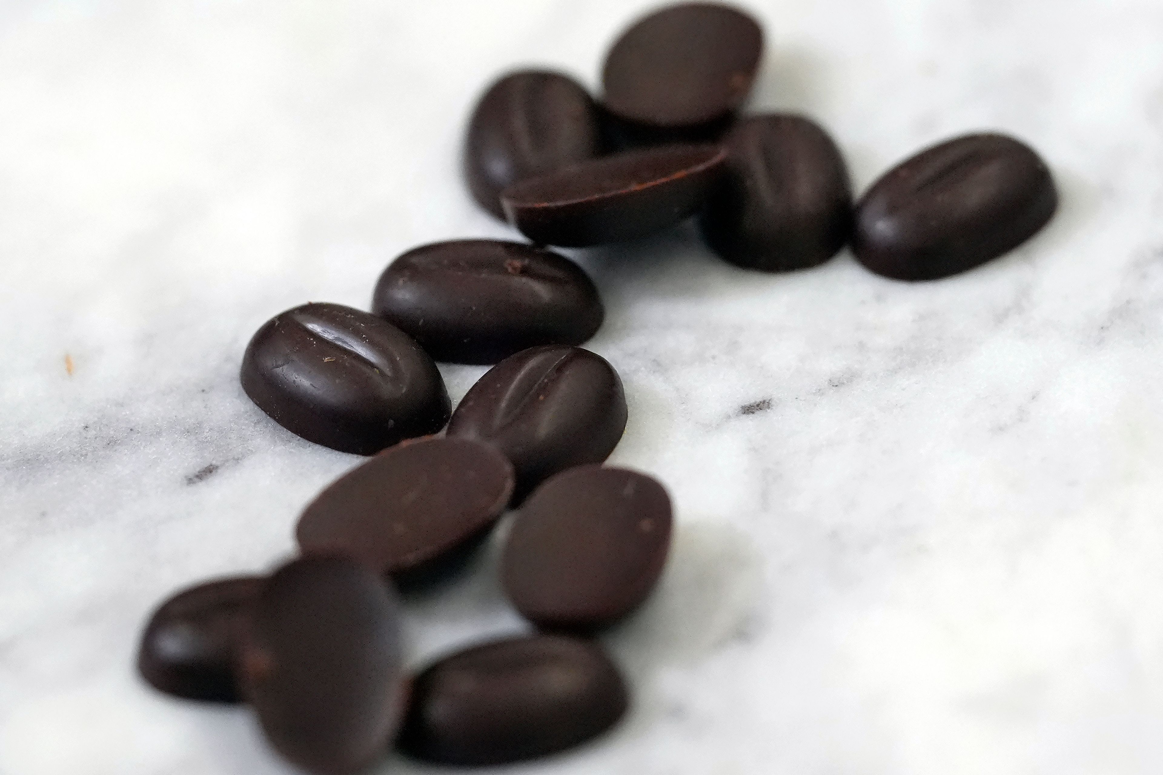 Chocolate callets are displayed at the California Cultured office in West Sacramento, Calif., Wednesday, Aug. 28, 2024. (AP Photo/Jeff Chiu)