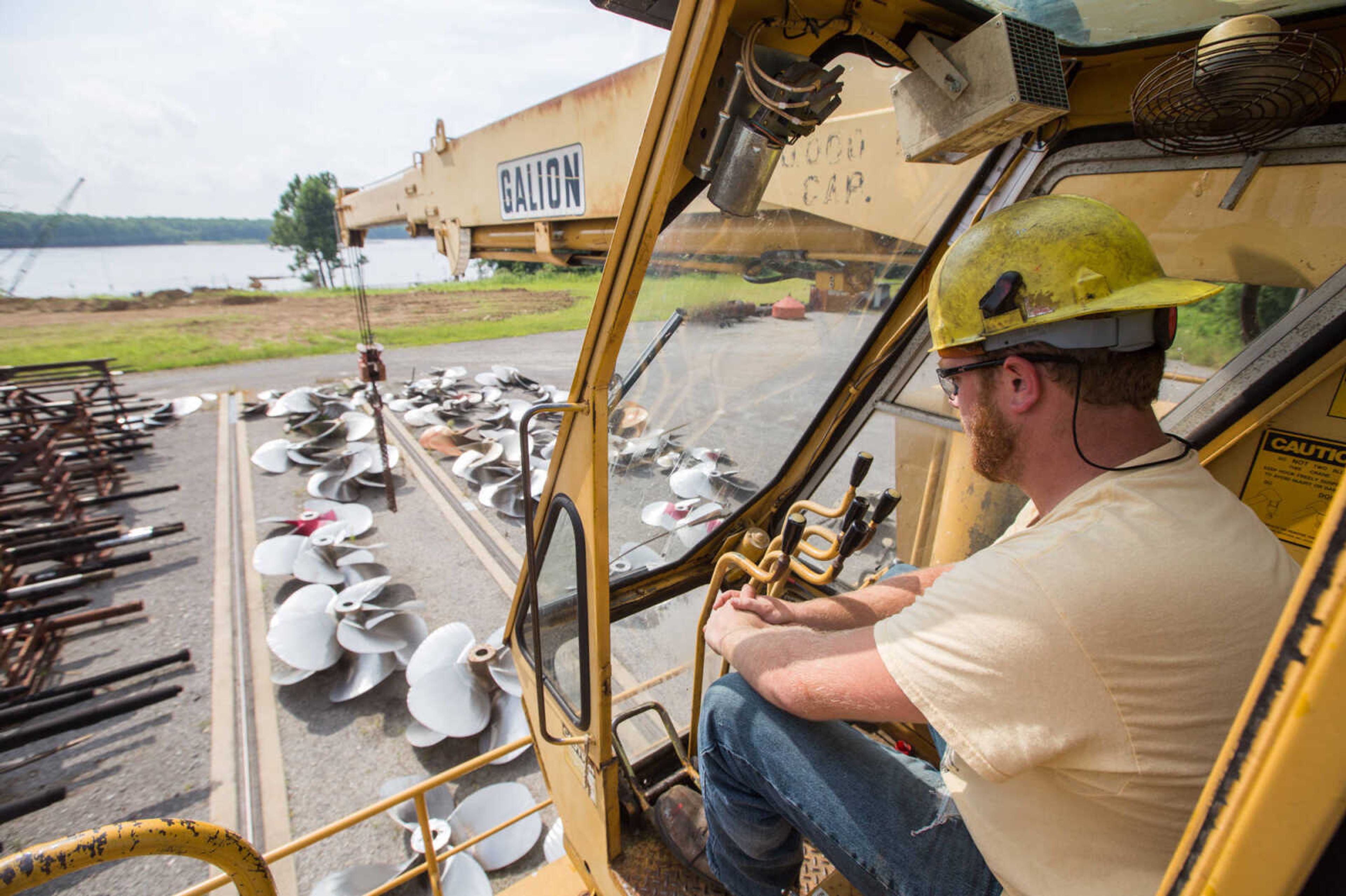 GLENN LANDBERG ~ glandberg@semissourian.com

Logan Farrenburg operates a crane outside the repair shop at Missouri Dry Dock and Repair Co. in Cape Girardeau Wednesday, July 28, 2016.