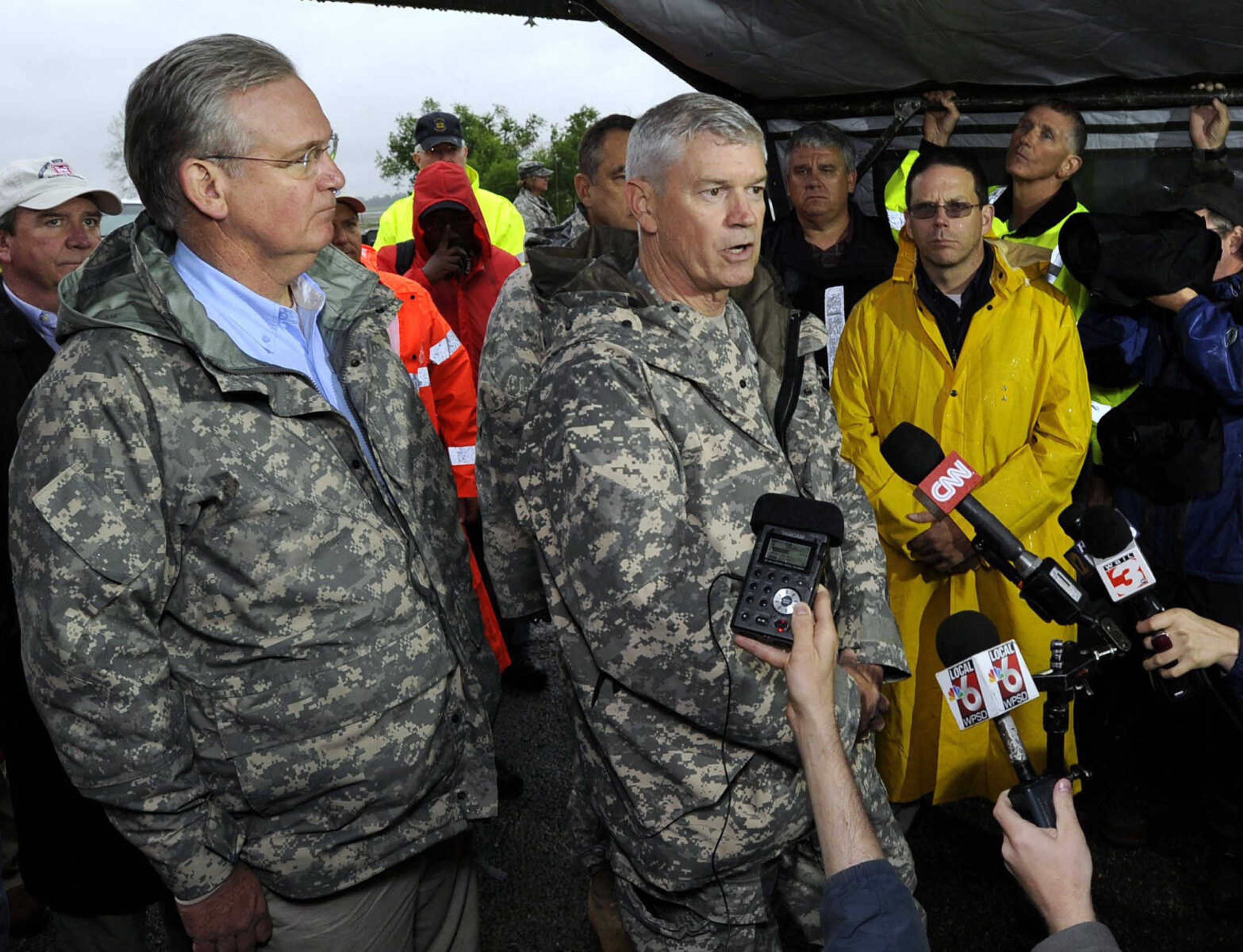 Maj. Gen. Michael Walsh speaks Sunday at a news conference with Gov. Jay Nixon, left, after they toured the Birds Point levee. (Fred Lynch)