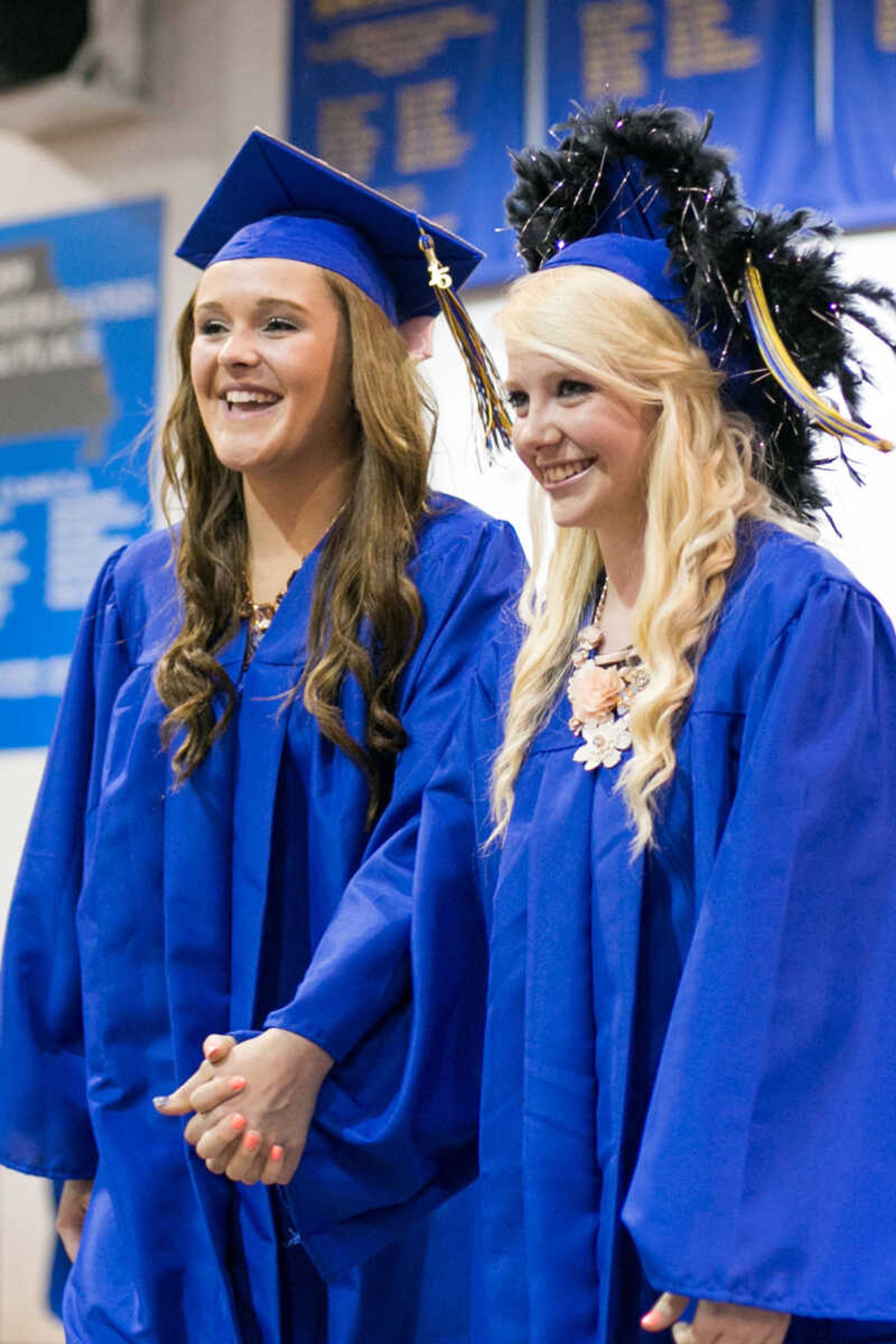 GLENN LANDBERG ~ glandberg@semissourian.com

Scott City seniors walk to their seats before the Scott City commencement Sunday, May 17, 2015 at Scott City High School.