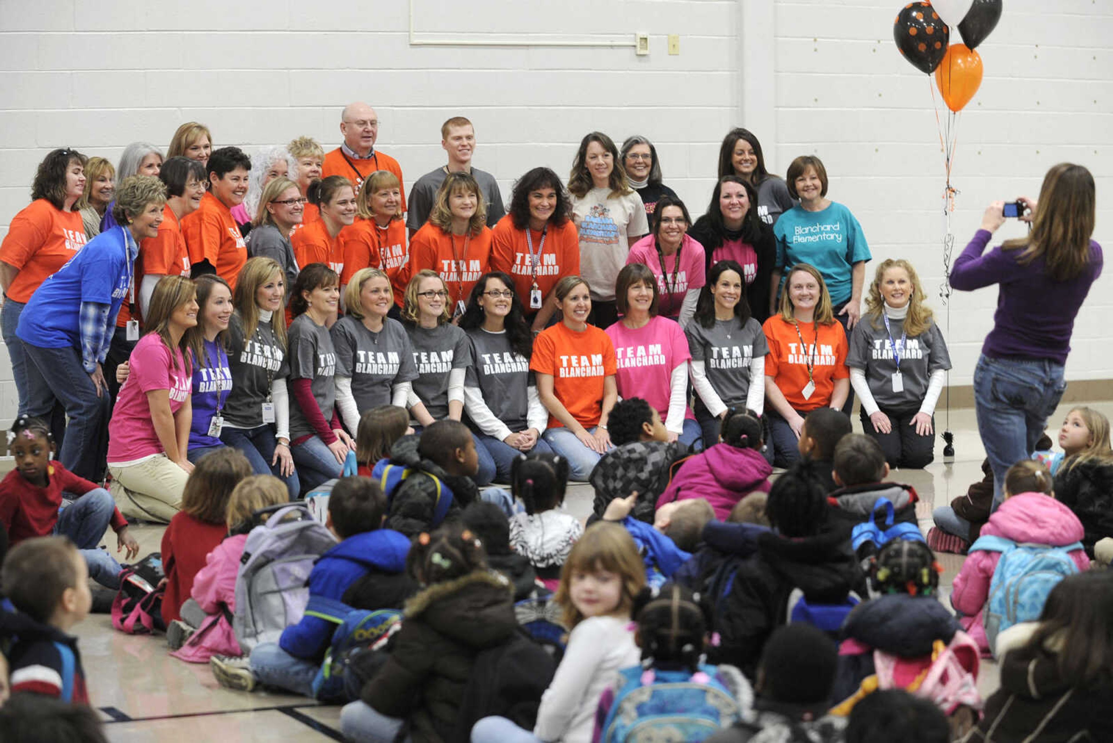 FRED LYNCH ~ flynch@semissourian.com
Team Blanchard poses for pictures Monday, Jan. 30, 2012 before starting their first day back to Blanchard Elementary School since the Dec. 6 fire at the school.