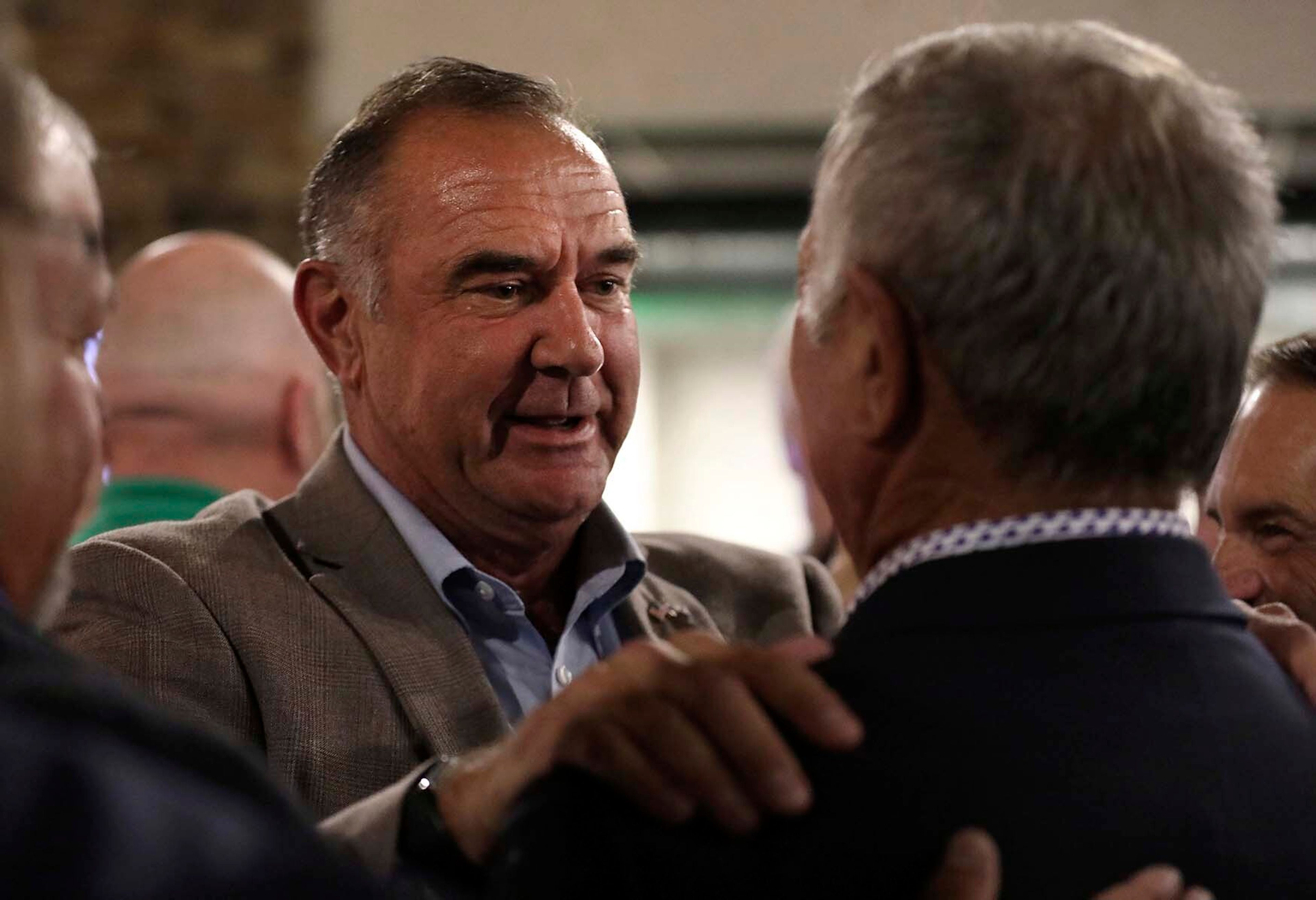 Mike Kehoe interacts with a supporter on Tuesday, Aug. 6, 2024, in Jefferson City, Mo. (Alix Queen/Missourian via AP)