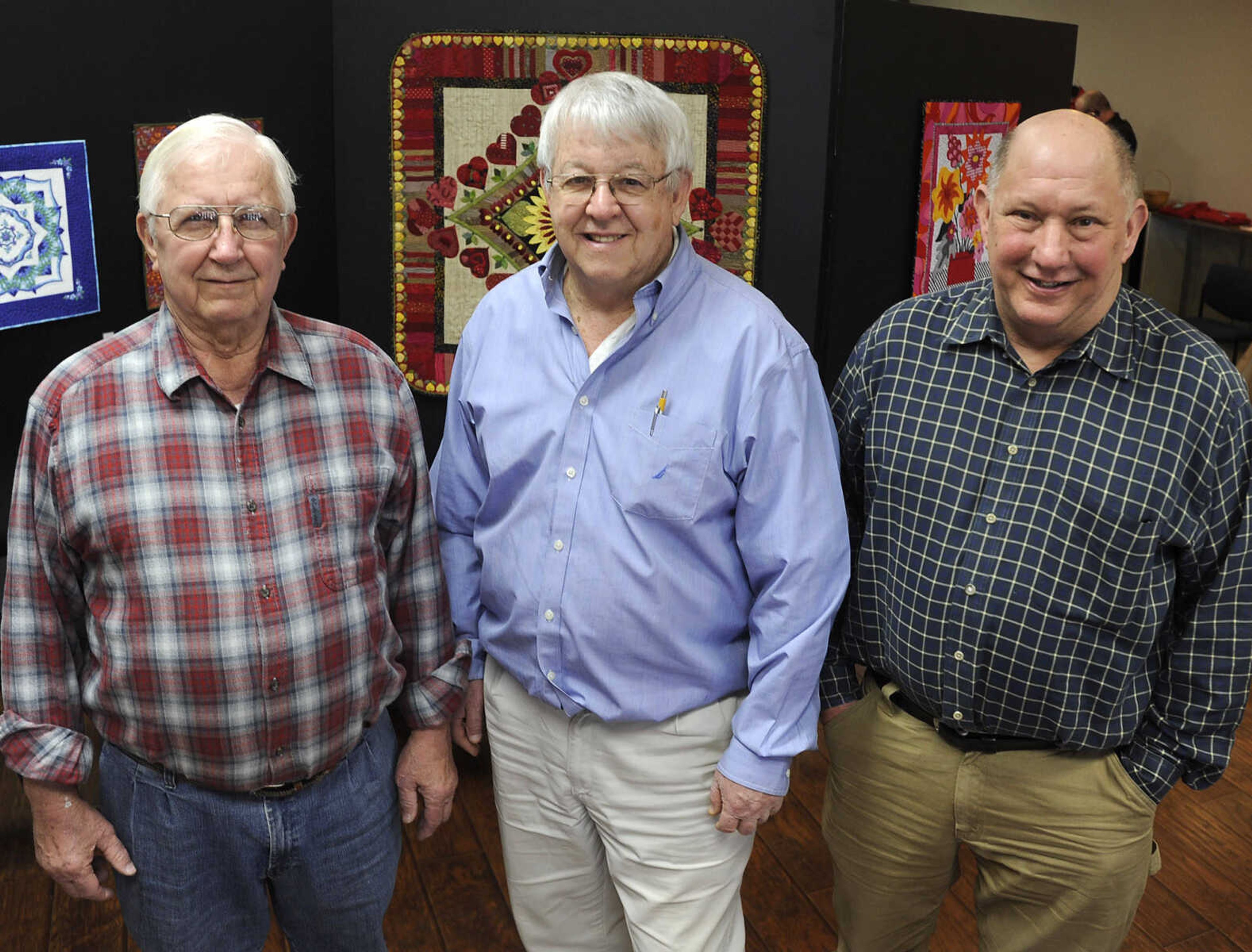 Bill Unger, left, Lynn Degenhardt and Gerard Fiehler pose for a photo Sunday, March 15, 2015 at the Cape Girardeau County History Center in Jackson.