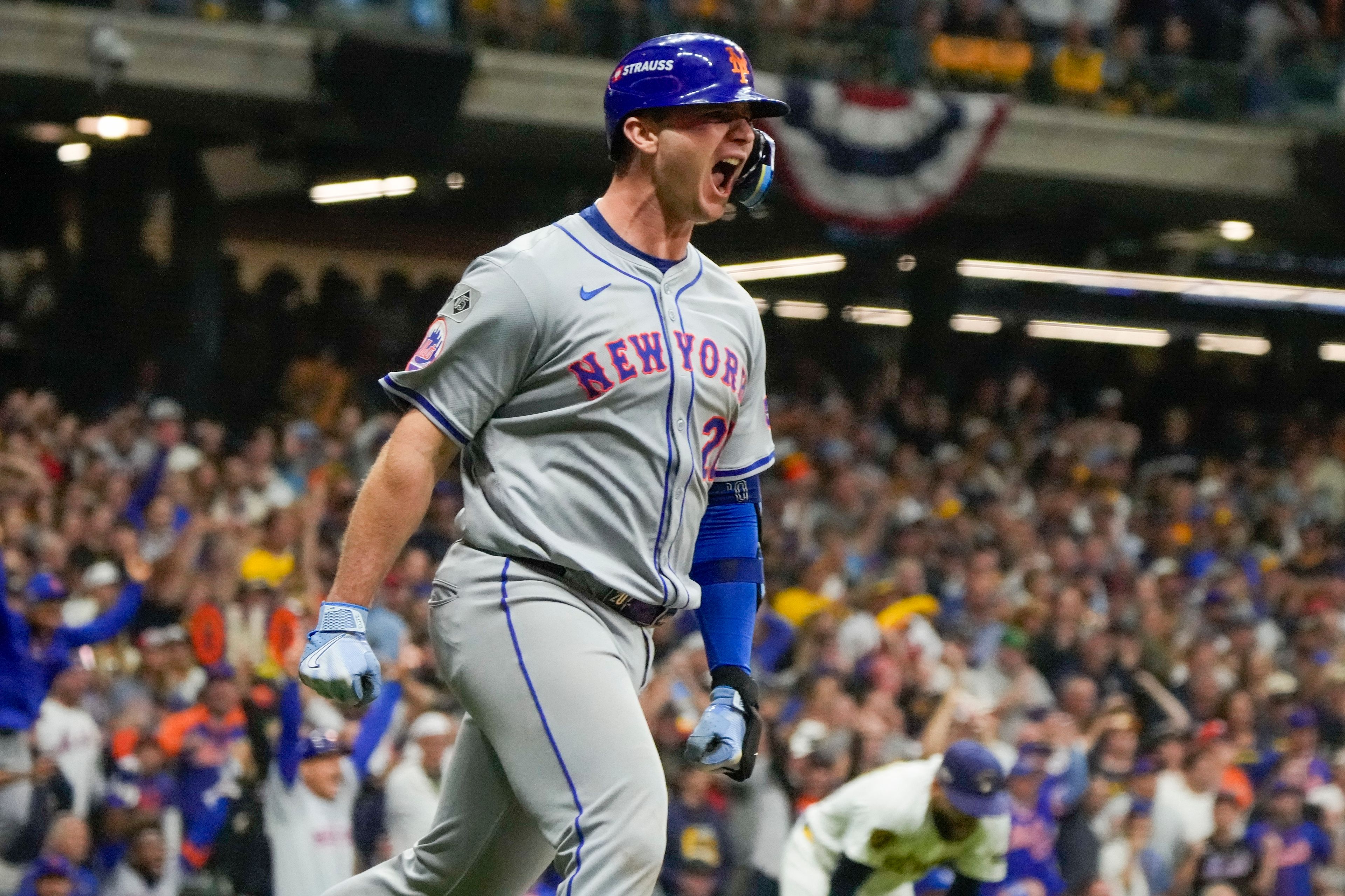 New York Mets' Pete Alonso reacts after hitting a three-run home run during the ninth inning of Game 3 of a National League wild card baseball game against the Milwaukee Brewers Thursday, Oct. 3, 2024, in Milwaukee. (AP Photo/Morry Gash)