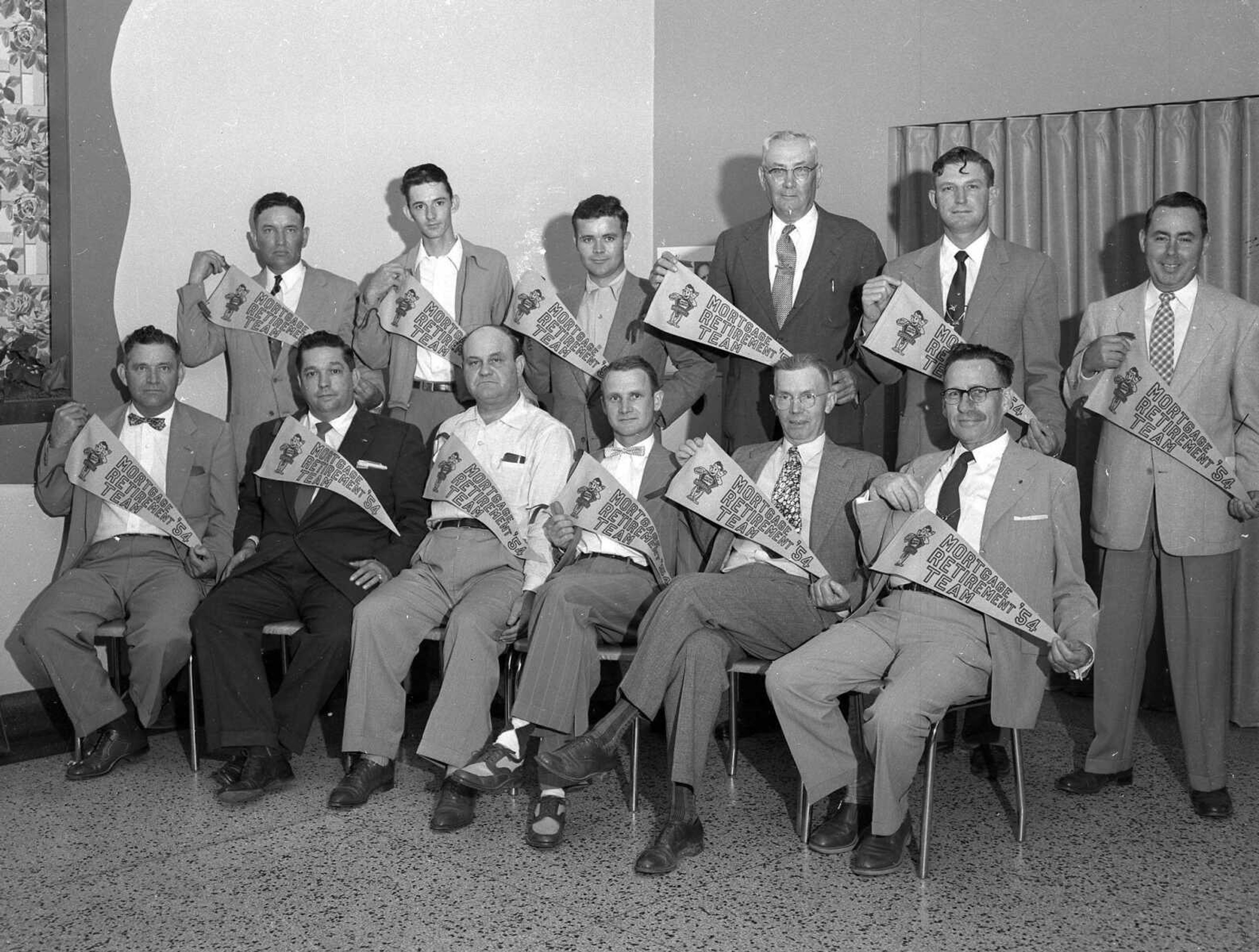 These men proclaim themselves members of the 1954 "Mortgage Retirement Team." If you can provide information about this image, send librarian Sharon Sanders a note at ssanders@semissourian.com.