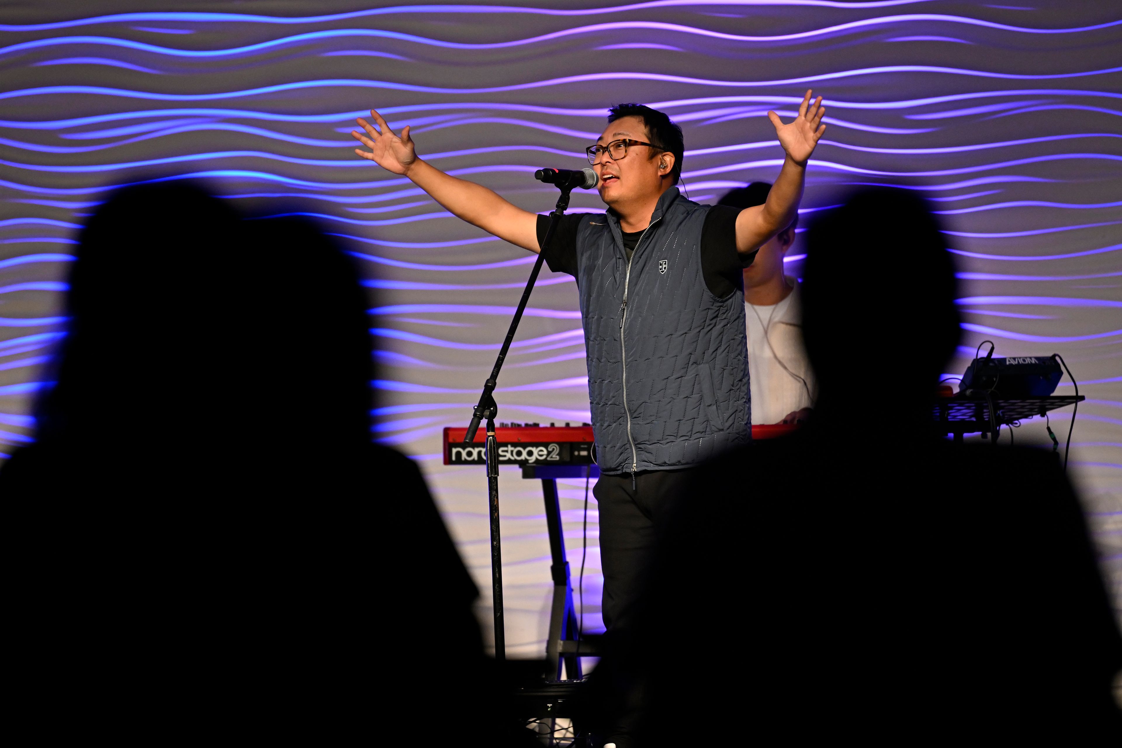 Sun Young sings during a service at the Christ Central Presbyterian Church, Sunday, Oct. 13, 2024 in Centreville. (AP Photo/John McDonnell)