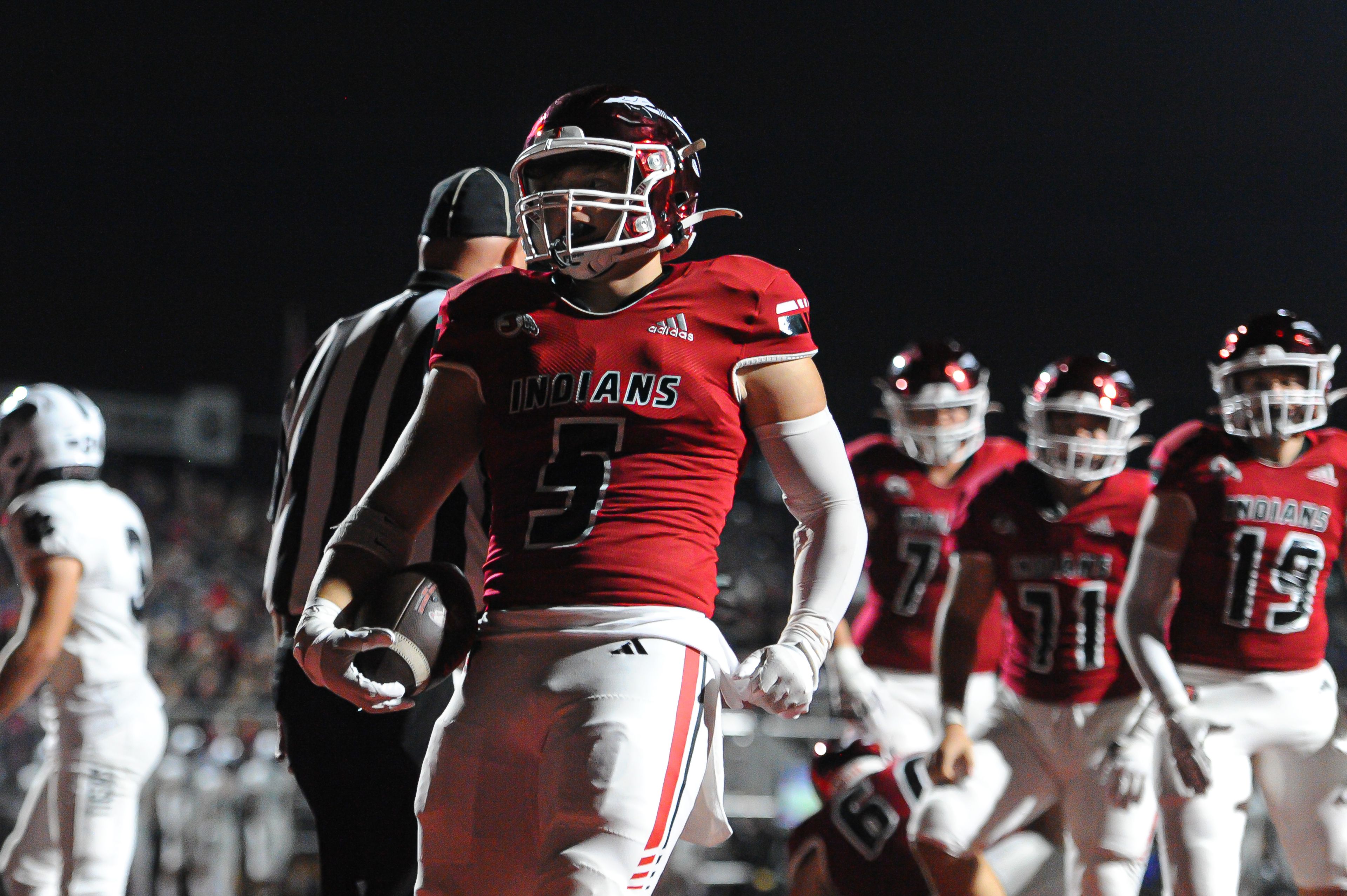 Jackson's Zach Crump finds pay dirt during a Friday, October 25, 2024 game between the Jackson Indians and the Festus Tigers at "The Pit" in Jackson, Mo. Jackson defeated Festus, 43-7.