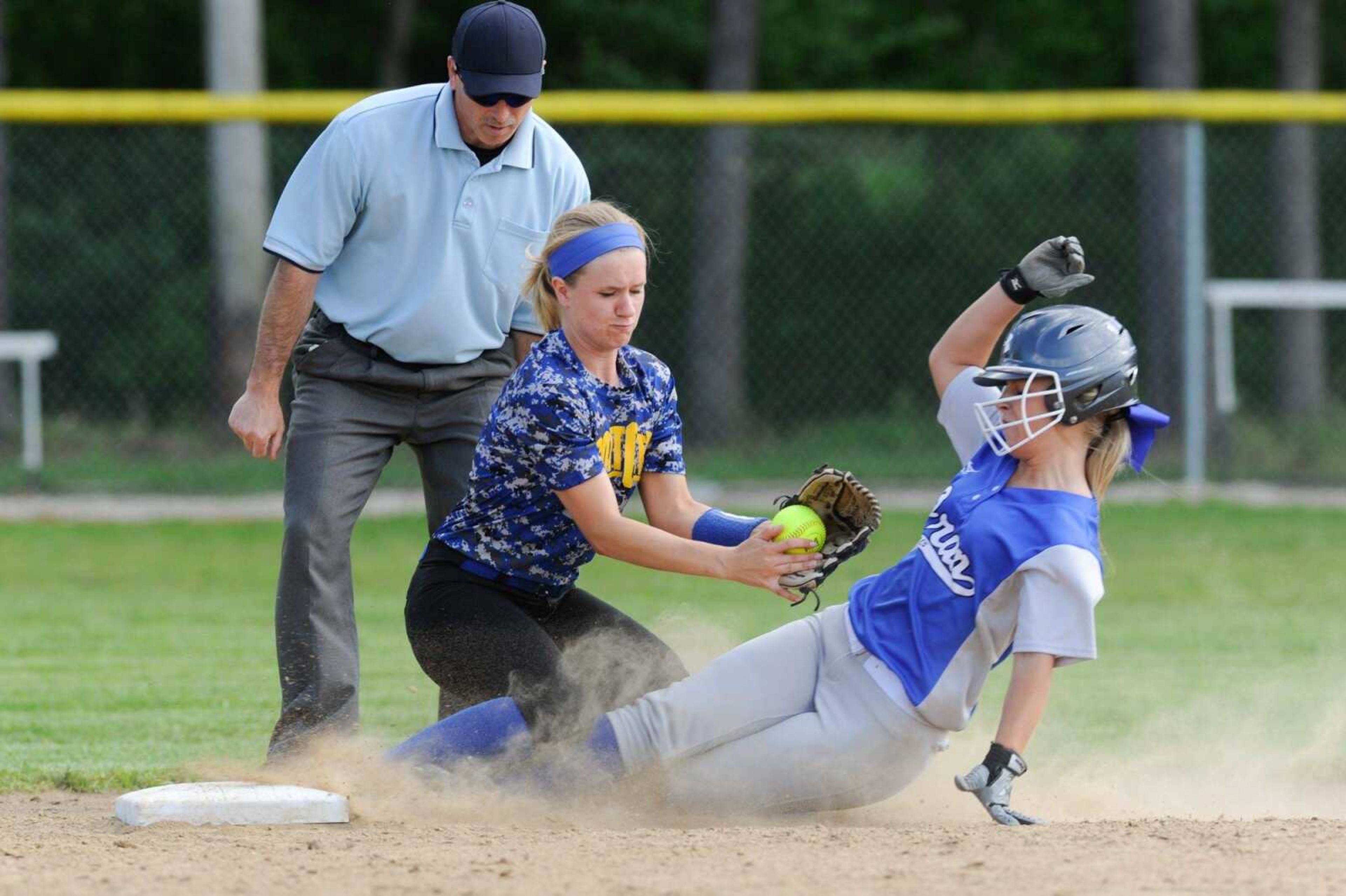 Oran's Sydney Kern safely slides into second base past Scott City's Valerie Bahr in the second inning during the Class 1 District 4 championship game Wednesday, May 4, 2016 in Marble Hill, Missouri.