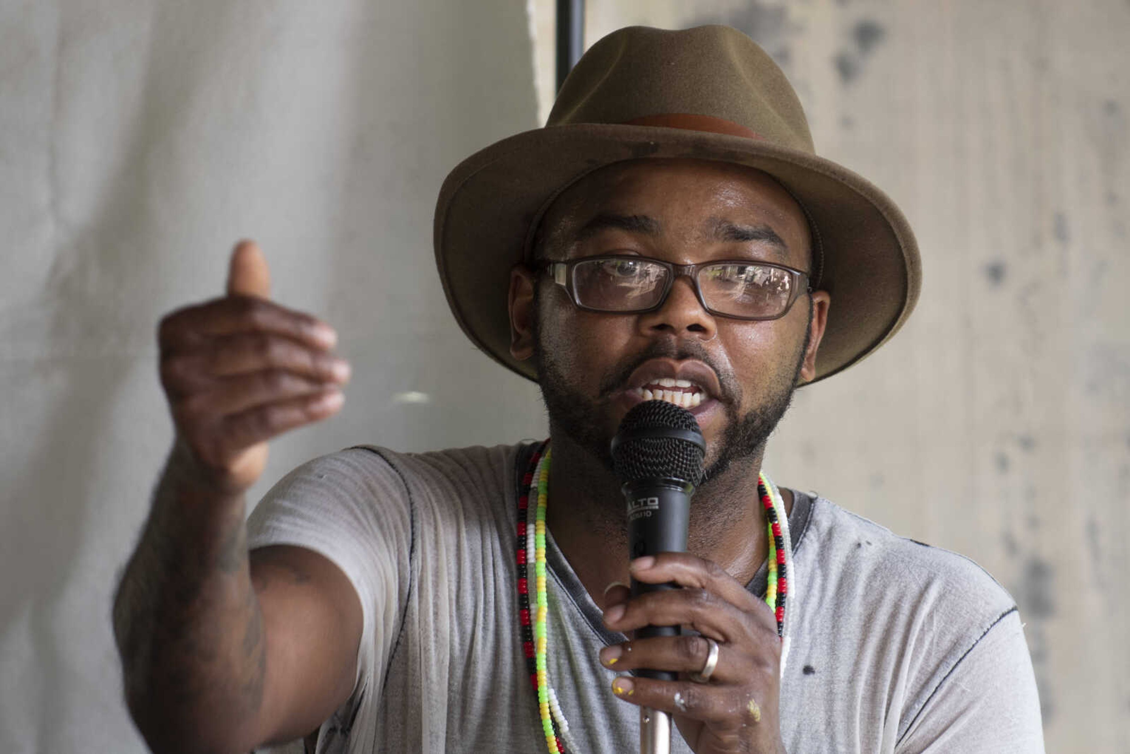 Local artist Malcolm McCrae speaks to attendees of a Cape Girardeau Community Art Day on Sunday, June 30, 2019, at Ranney Park in Cape Girardeau.