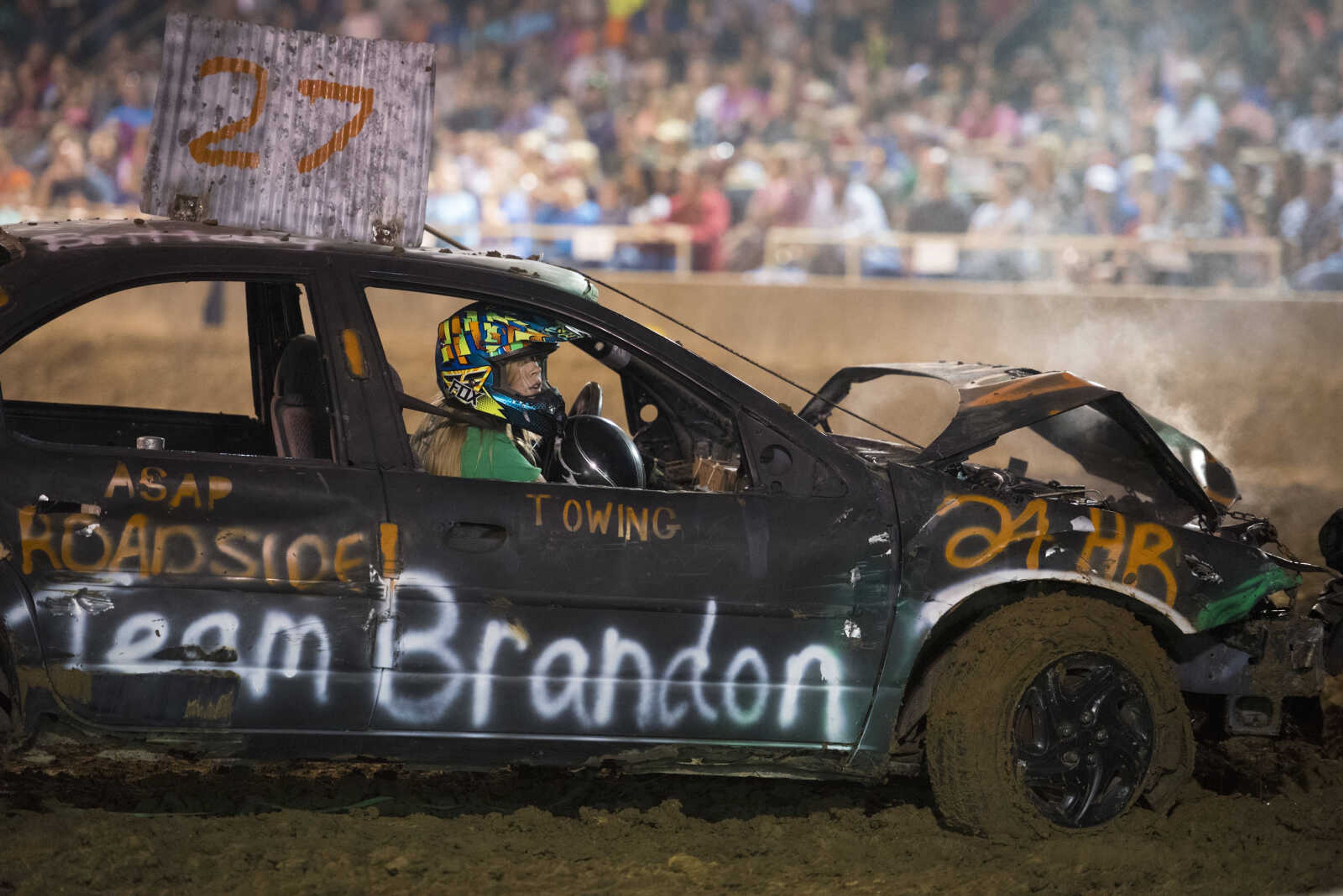 A rider sits in an eliminated car during the Auto Tire & Parts Dual Demo Derby September 9, 2017, at the SEMO District Fair in Cape Girardeau.