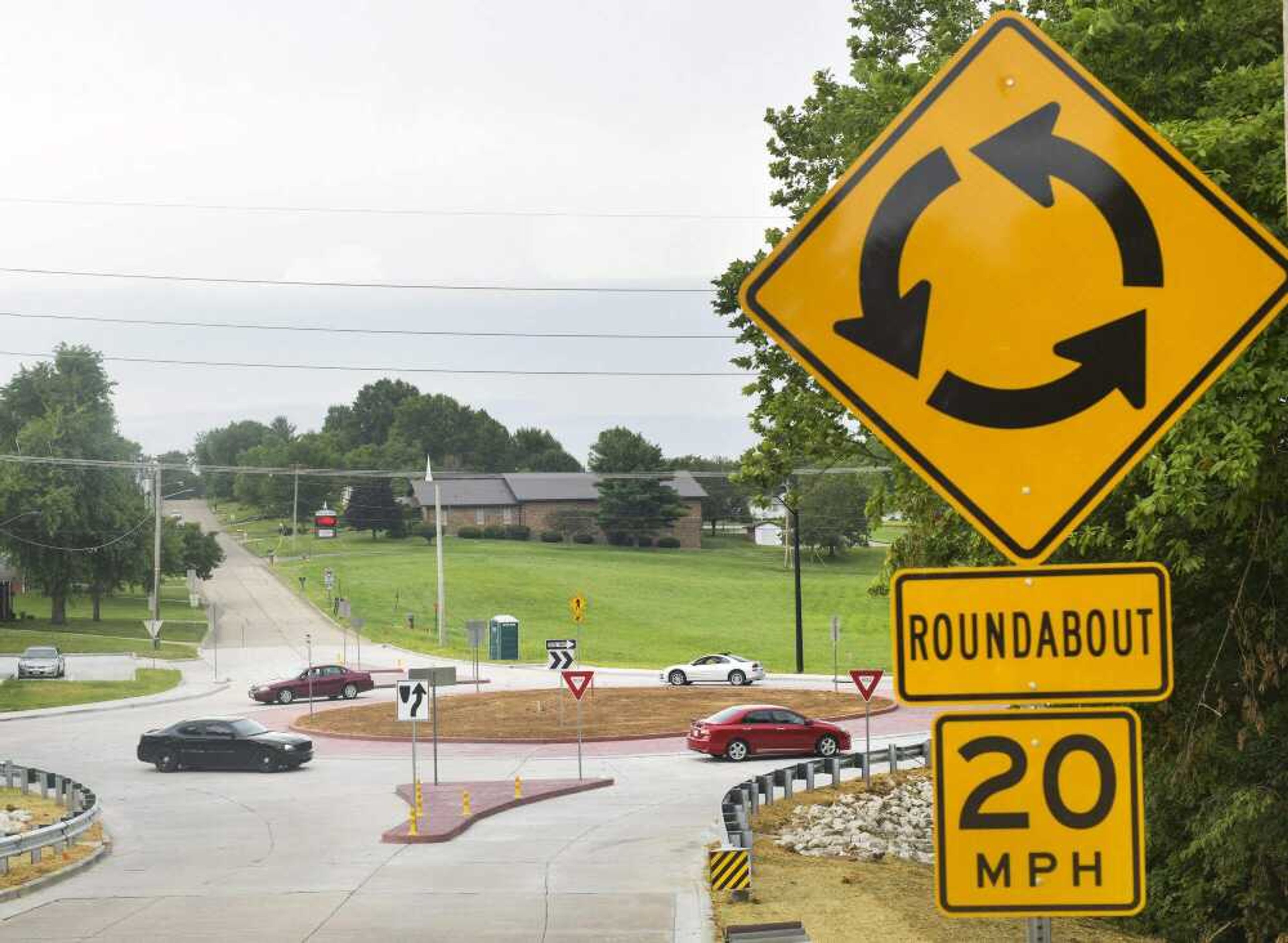 Motorists drive through a roundabout at the intersection of East Main Street and Shawnee Boulevard in Jackson on June 30, 2020. A newer roundabout in the city, planned for the intersection of Deerwood Drive and North High Street, will not feature any kind of statue or monument due to updated MoDOT specifications.