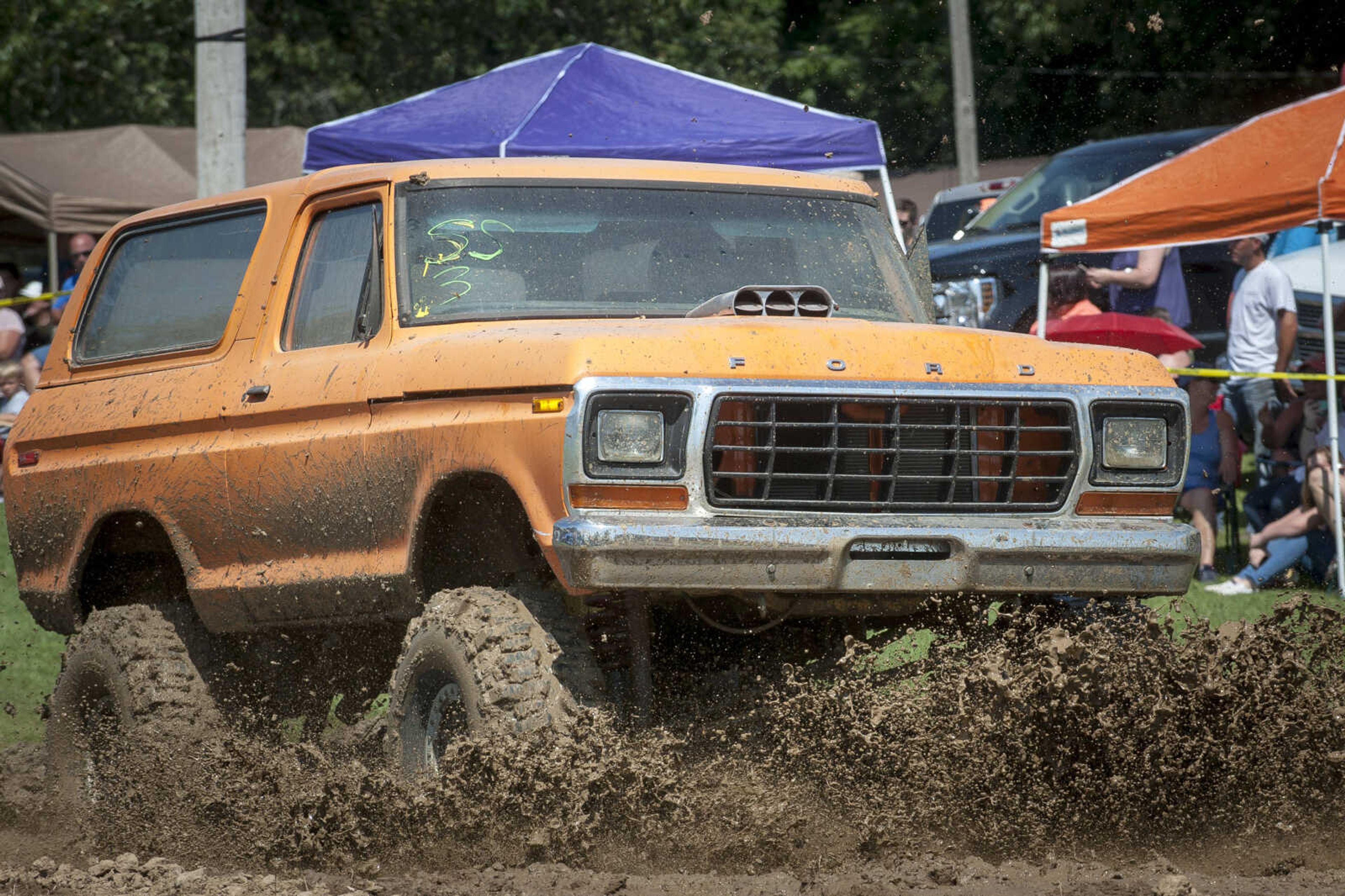 Boyd Thompson competes in the annual mud races during Benton Neighbor Days  Saturday, Aug. 31, 2019 in Benton.